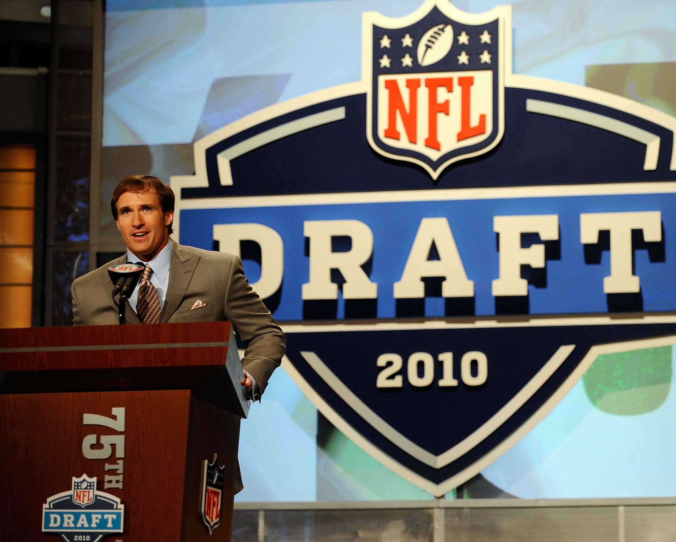 NEW YORK - APRIL 22: Quarterback Drew Brees of the New Orleans Saints announces that the Saints selected Patrick Robinson from the Florida State with the number 32 overall pick during the first round of the 2010 NFL Draft at Radio City Music Hall on Apri NEW YORK - APRIL 22: Quarterback Drew Brees of the New Orleans Saints announces that the Saints selected Patrick Robinson from the Florida State with the number 32 overall pick during the first round of the 2010 NFL Draft at Radio City Music Hall on Apri
