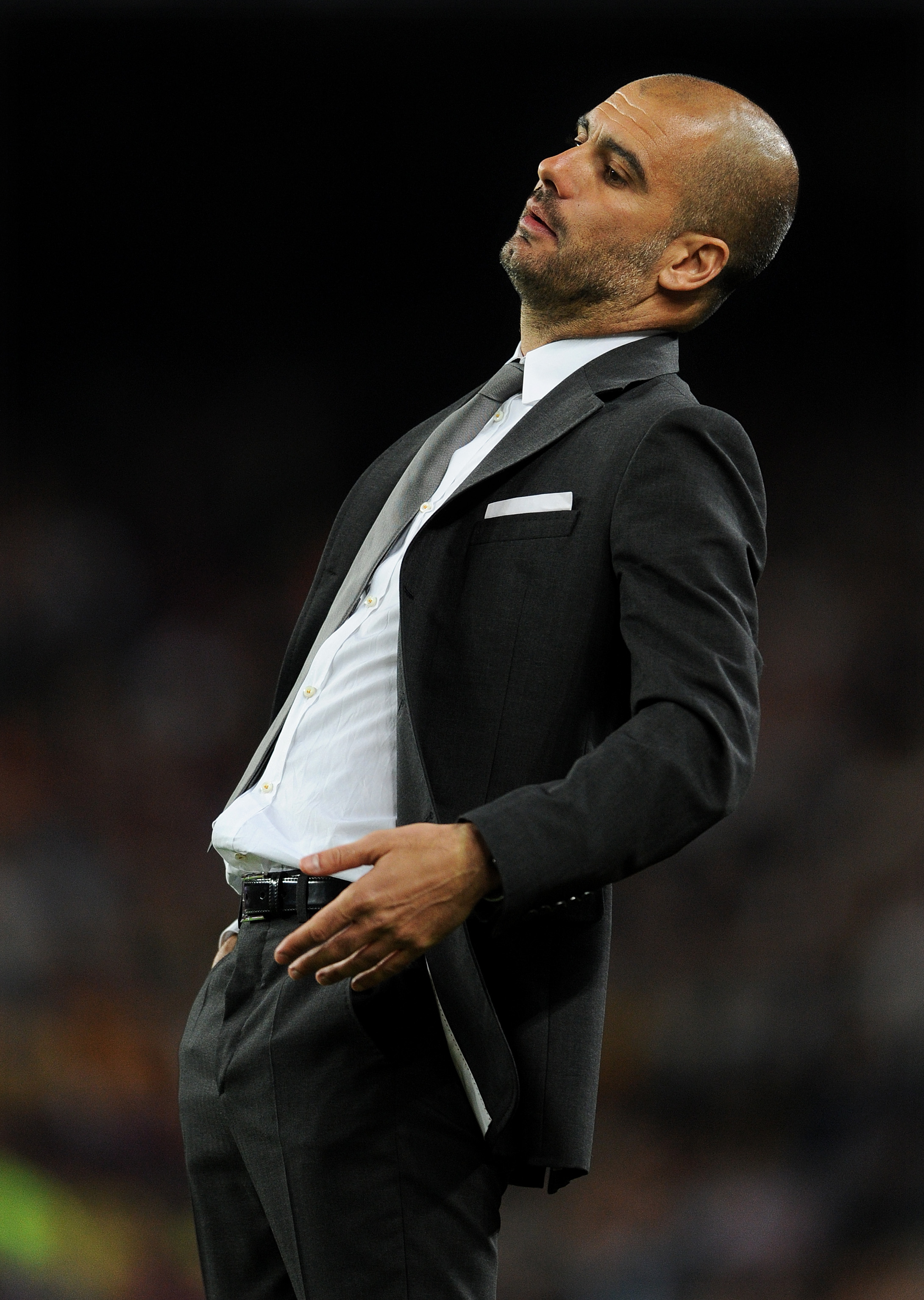 BARCELONA, SPAIN - APRIL 09:  Head coach Josep Guardiola of Barcelona reacts as he follows the game during the la Liga match between FC Barcelona and UD Almeria at the Camp Nou stadium on April 9, 2011 in Barcelona, Spain.  (Photo by Jasper Juinen/Getty I