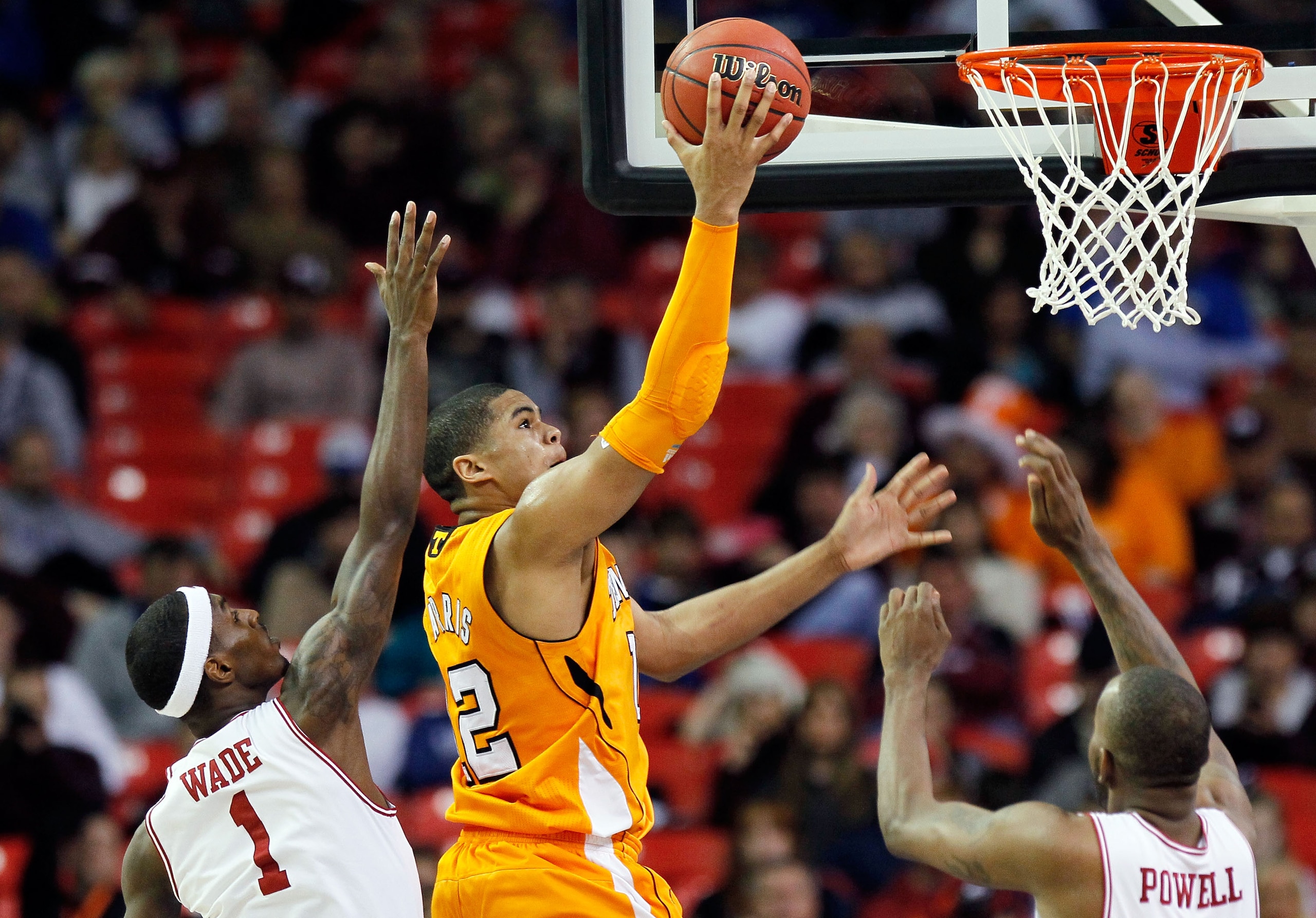 ATLANTA, GA - MARCH 10:  Tobias Harris #12 of the Tennessee Volunteers shoots over Marshawn Powell #33 and Mardracus Wade #1 of the Arkansas Razorbacks during the first round of the SEC Men's Basketball Tournament at the Georgia Dome on March 10, 2011 in