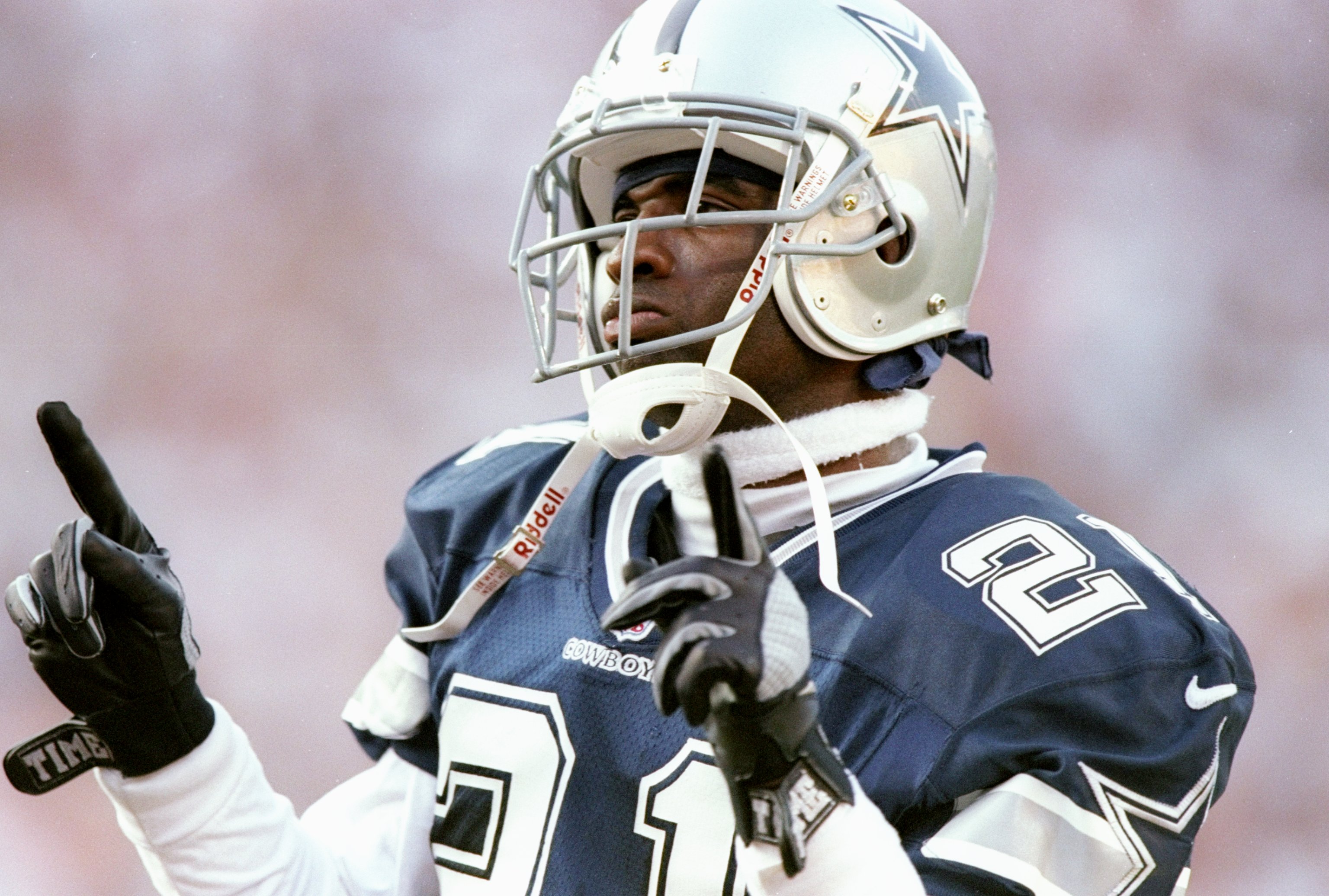 7 Sep 1997:  Defensive back Deion Sanders of the Dallas Cowboys celebrates during a game against the Arizona Cardinals at Sun Devil Stadium in Tempe, Arizona.  The Cardinals won the game, 25-22. Mandatory Credit: Jed Jacobsohn  /Allsport