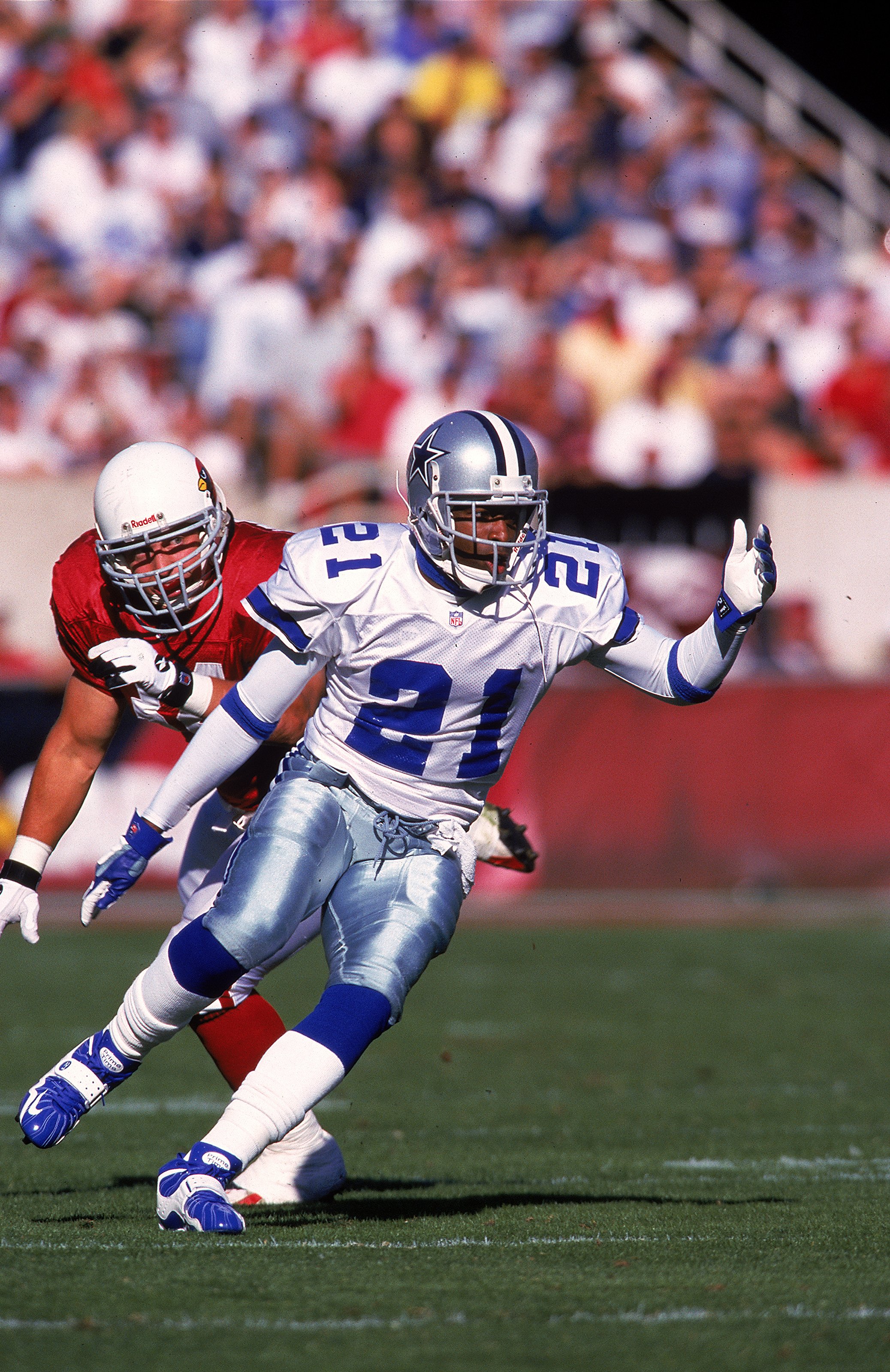 21 Nov 1999: Deion Sanders #21 of the Dallas Cowboys scrambles on the field during the game against the Arizona Cardinals at the Sun Devil Stadium in Tempe, Arizona. The Cardinals defeated the Cowboys 9-13. Mandatory Credit: Otto Greule Jr.  /Allsport
