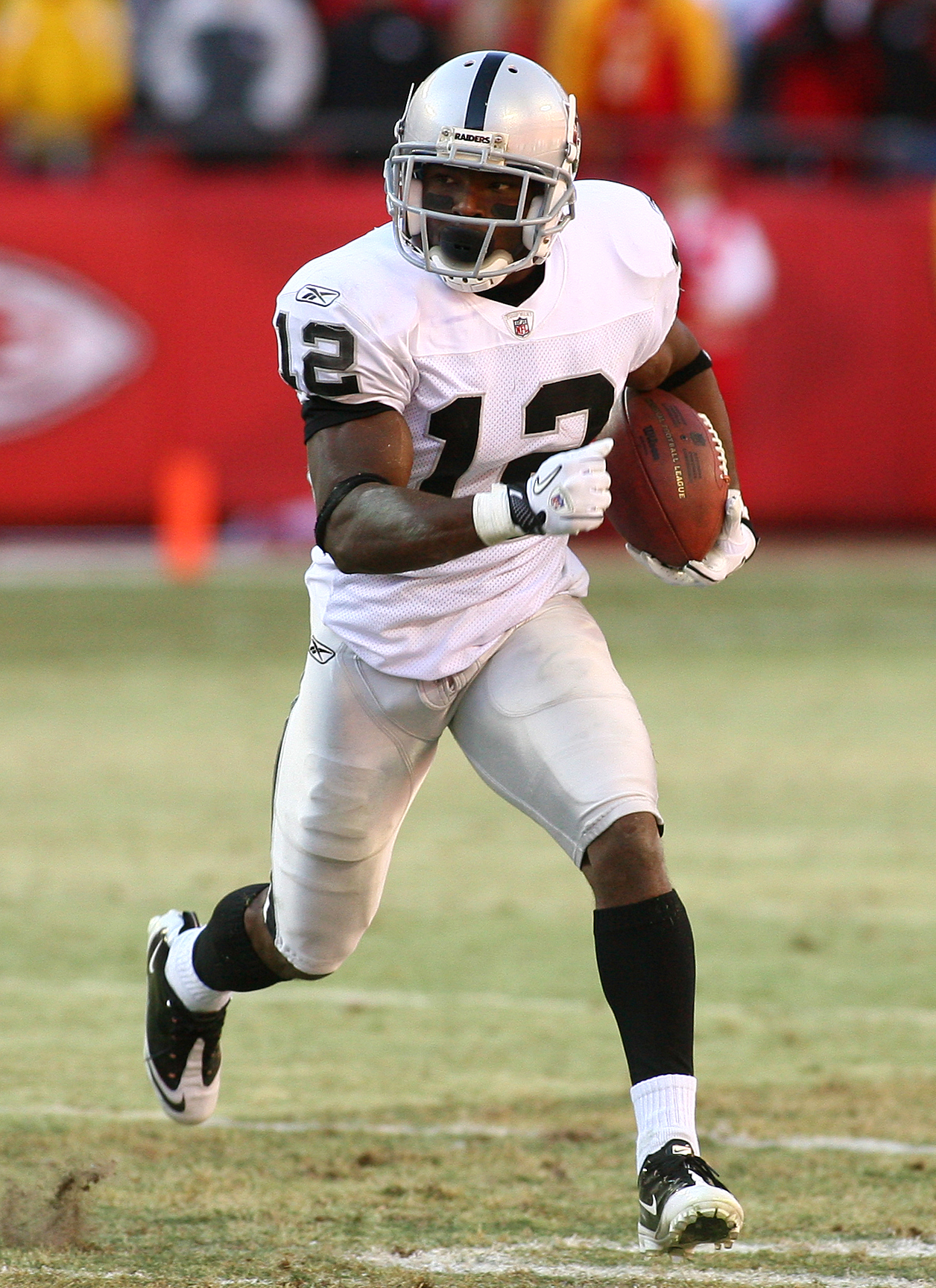 KANSAS CITY, MO - JANUARY 02:  Wide receiver Jacoby Ford #12 of the Oakland Raiders runs down field in a game against the Kansas City Chiefs at Arrowhead Stadium on January 2, 2011 in Kansas City, Missouri.  (Photo by Tim Umphrey/Getty Images)