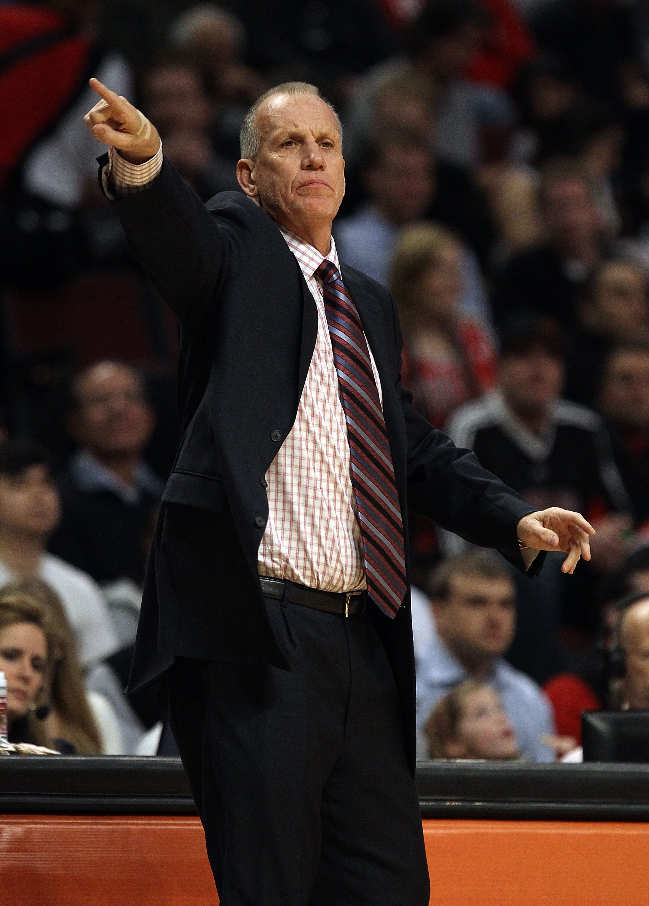 CHICAGO, IL - MARCH 28: Head coach Doug Collins of the Philadelphia 76ers gives instructions to his team during a game against the Chicago Bulls at the United Center on March 28, 2011 in Chicago, Illinois. The 76ers defeated the Bulls 97-85. NOTE TO USER: