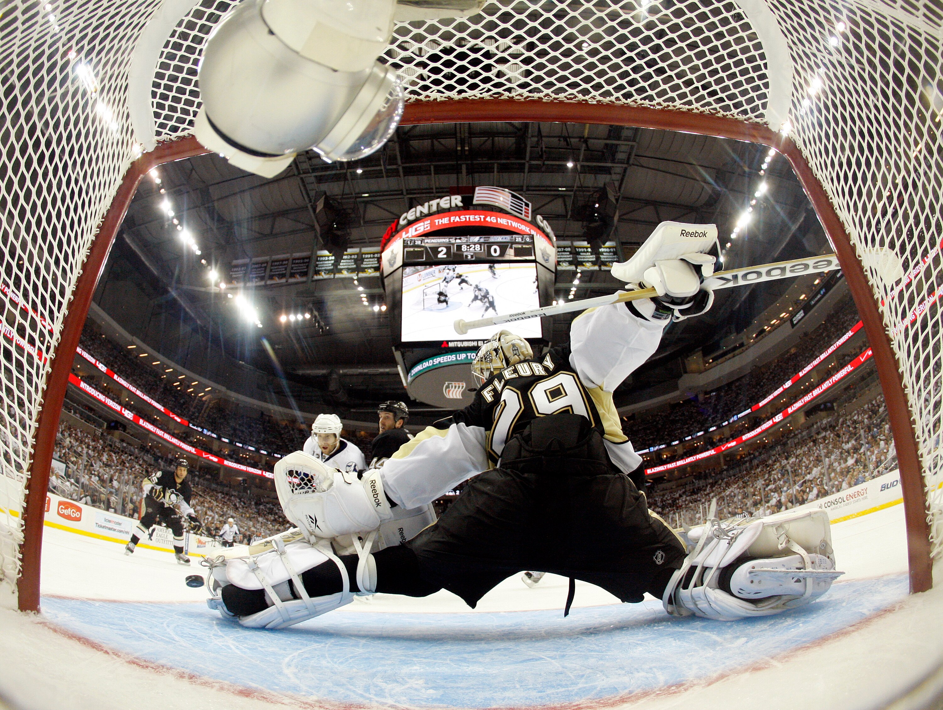 PITTSBURGH, PA - APRIL 13: Marc-Andre Fleury #29 of the Pittsburgh Penguins makes a kick save against the Tampa Bay Lightning in Game One of the Eastern Conference Quarterfinals during the 2011 NHL Stanley Cup Playoffs at Consol Energy Center on April 13,