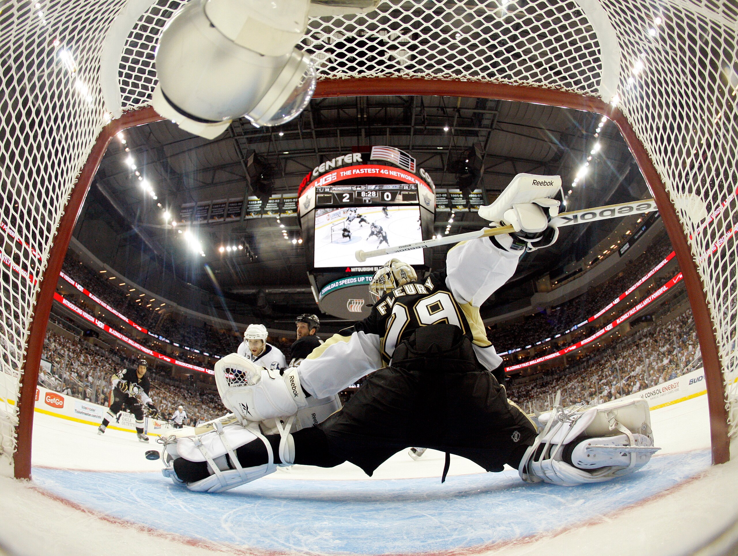 PITTSBURGH, PA - APRIL 13: Marc-Andre Fleury #29 of the Pittsburgh Penguins makes a kick save against the Tampa Bay Lightning in Game One of the Eastern Conference Quarterfinals during the 2011 NHL Stanley Cup Playoffs at Consol Energy Center on April 13, PITTSBURGH, PA - APRIL 13: Marc-Andre Fleury #29 of the Pittsburgh Penguins makes a kick save against the Tampa Bay Lightning in Game One of the Eastern Conference Quarterfinals during the 2011 NHL Stanley Cup Playoffs at Consol Energy Center on April 13,