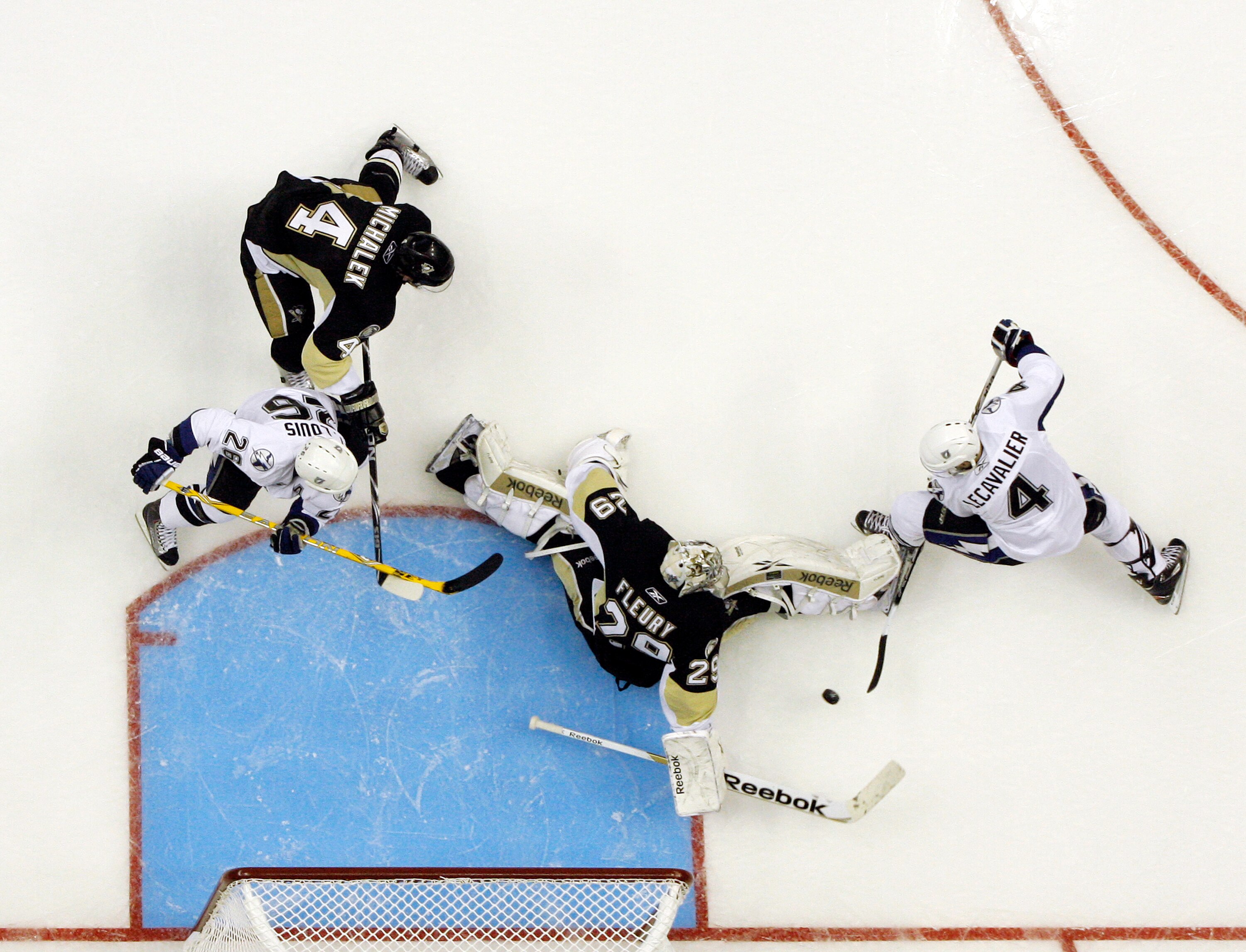 PITTSBURGH, PA - APRIL 13: Marc-Andre Fleury #29 of the Pittsburgh Penguins makes a save on Vincent Lecavalier #4 of the Tampa Bay Lightning in Game One of the Eastern Conference Quarterfinals during the 2011 NHL Stanley Cup Playoffs at Consol Energy Cent