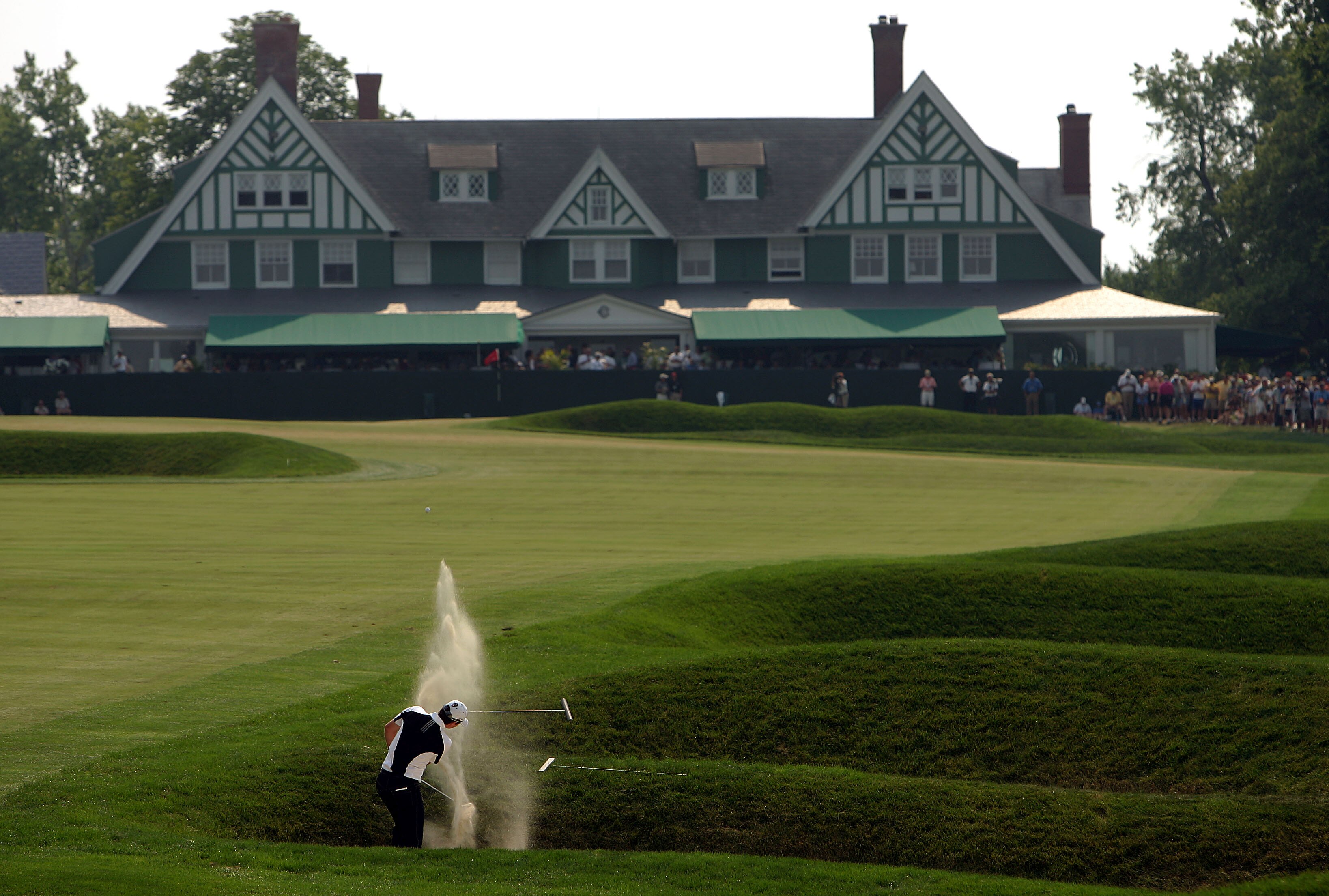 OAKMONT, PA - JUNE 17:  Justin Rose of England hits as shot out of a bunker on the ninth hole during the final round of the 107th U.S. Open Championship at Oakmont Country Club on June 17, 2007 in Oakmont, Pennsylvania.  (Photo by Donald Miralle/Getty Ima