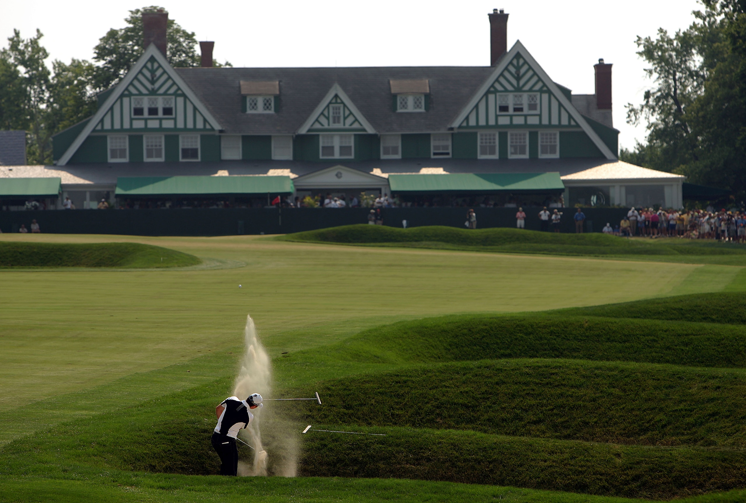 OAKMONT, PA - JUNE 17:  Justin Rose of England hits as shot out of a bunker on the ninth hole during the final round of the 107th U.S. Open Championship at Oakmont Country Club on June 17, 2007 in Oakmont, Pennsylvania.  (Photo by Donald Miralle/Getty Ima