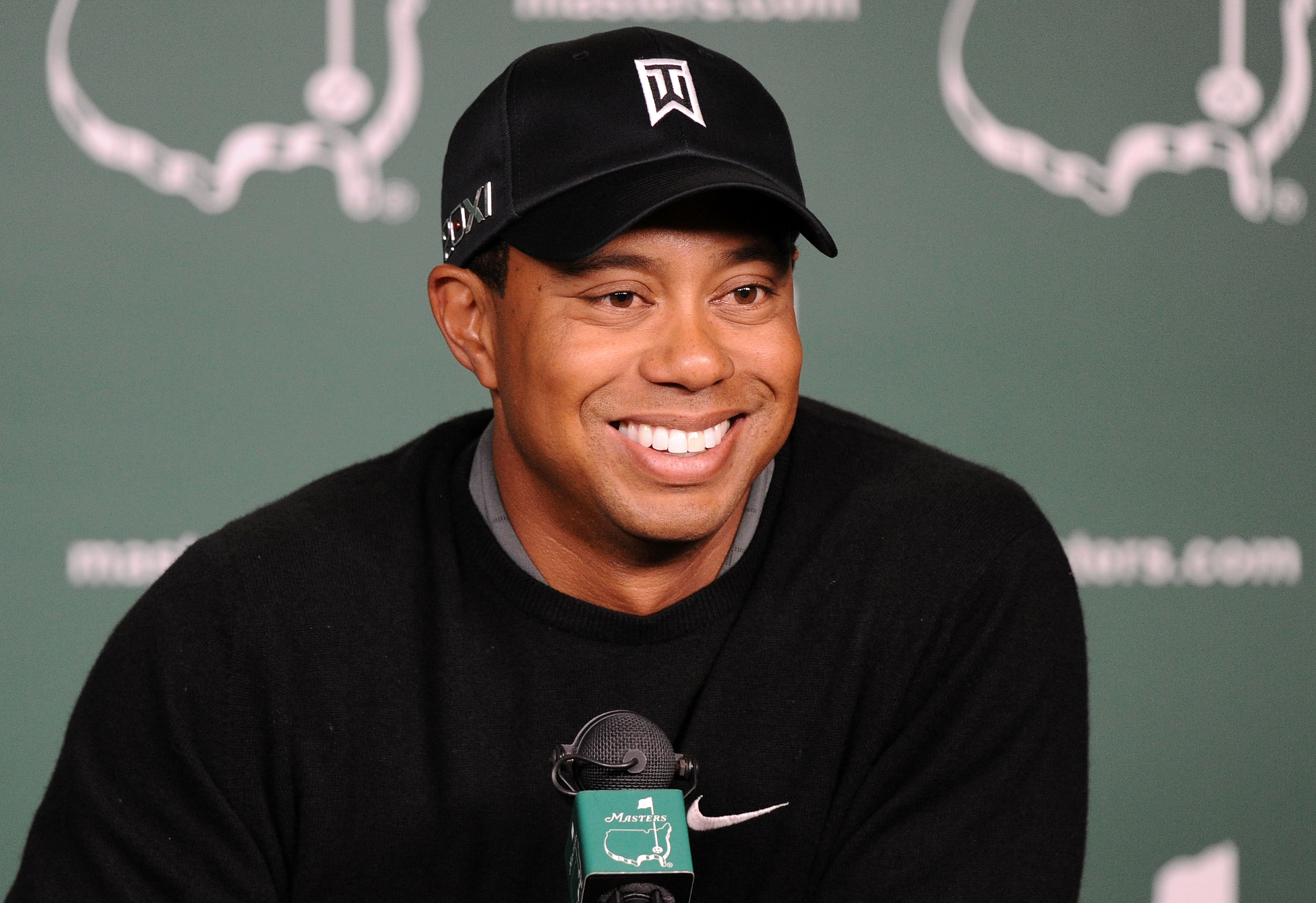 AUGUSTA, GA - APRIL 05:  Tiger Woods speaks to the media during a press conference during a practice round prior to the 2011 Masters Tournament at Augusta National Golf Club on April 5, 2011 in Augusta, Georgia.  (Photo by Harry How/Getty Images)