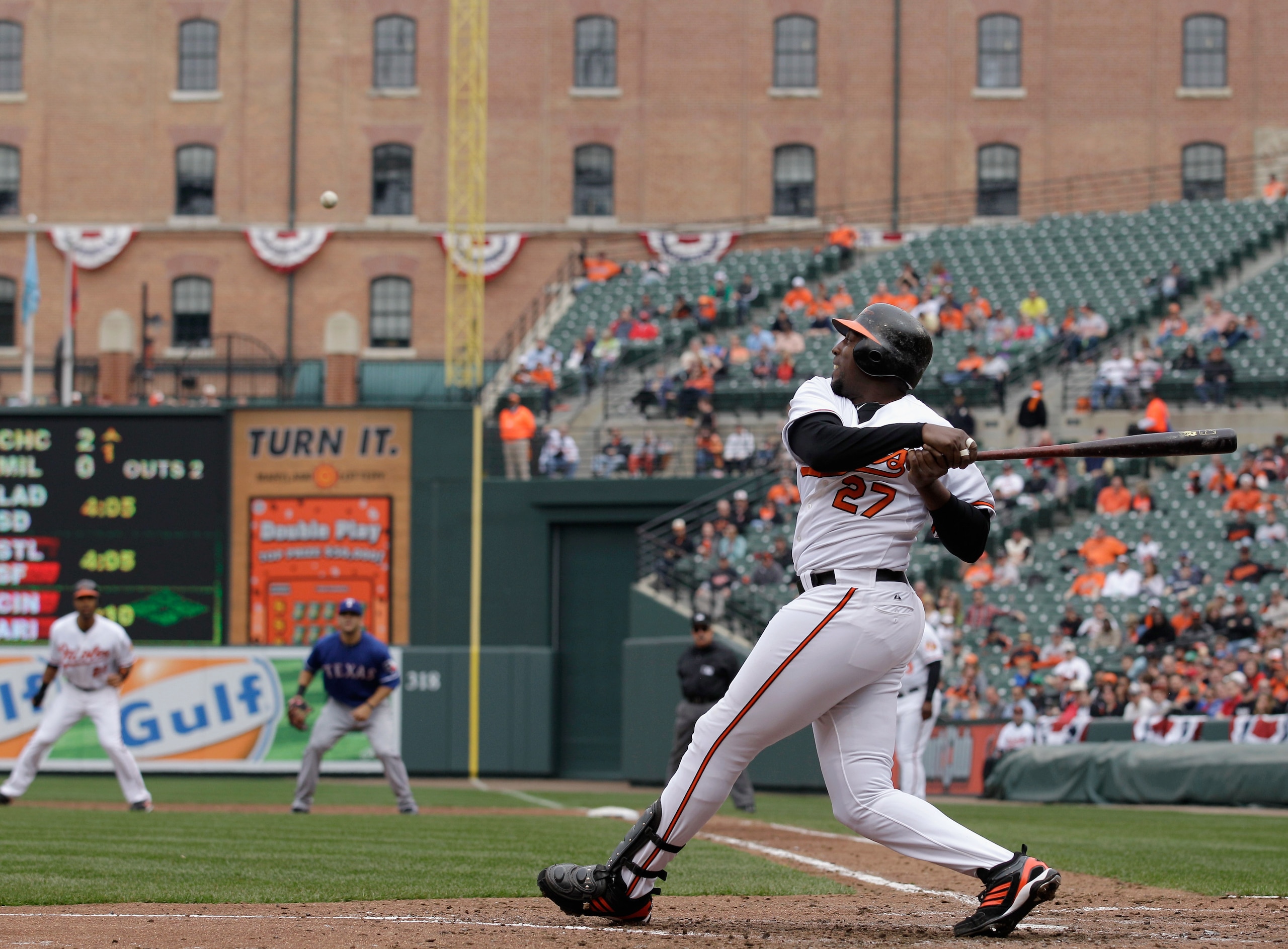 BALTIMORE, MD - APRIL 10: Vladimir Guerrero #27 of the Baltimore Orioles at the plate against the Texas Rangers at Oriole Park at Camden Yards on April 10, 2011 in Baltimore, Maryland.  (Photo by Rob Carr/Getty Images)