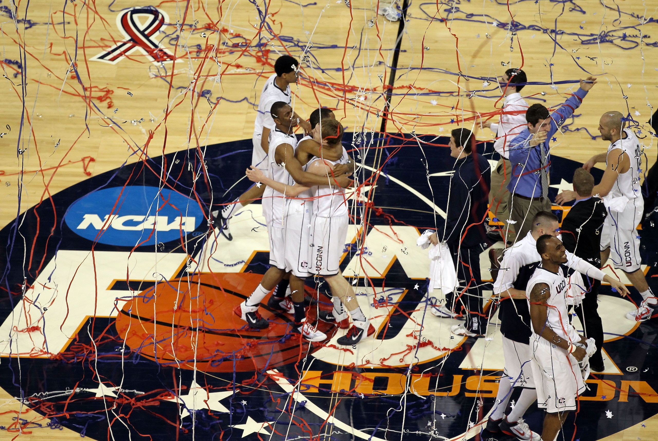 HOUSTON, TX - APRIL 04:  The Connecticut Huskies react after defeating the Butler Bulldogs to win the National Championship Game of the 2011 NCAA Division I Men's Basketball Tournament by a score of 53-41 at Reliant Stadium on April 4, 2011 in Houston, Te
