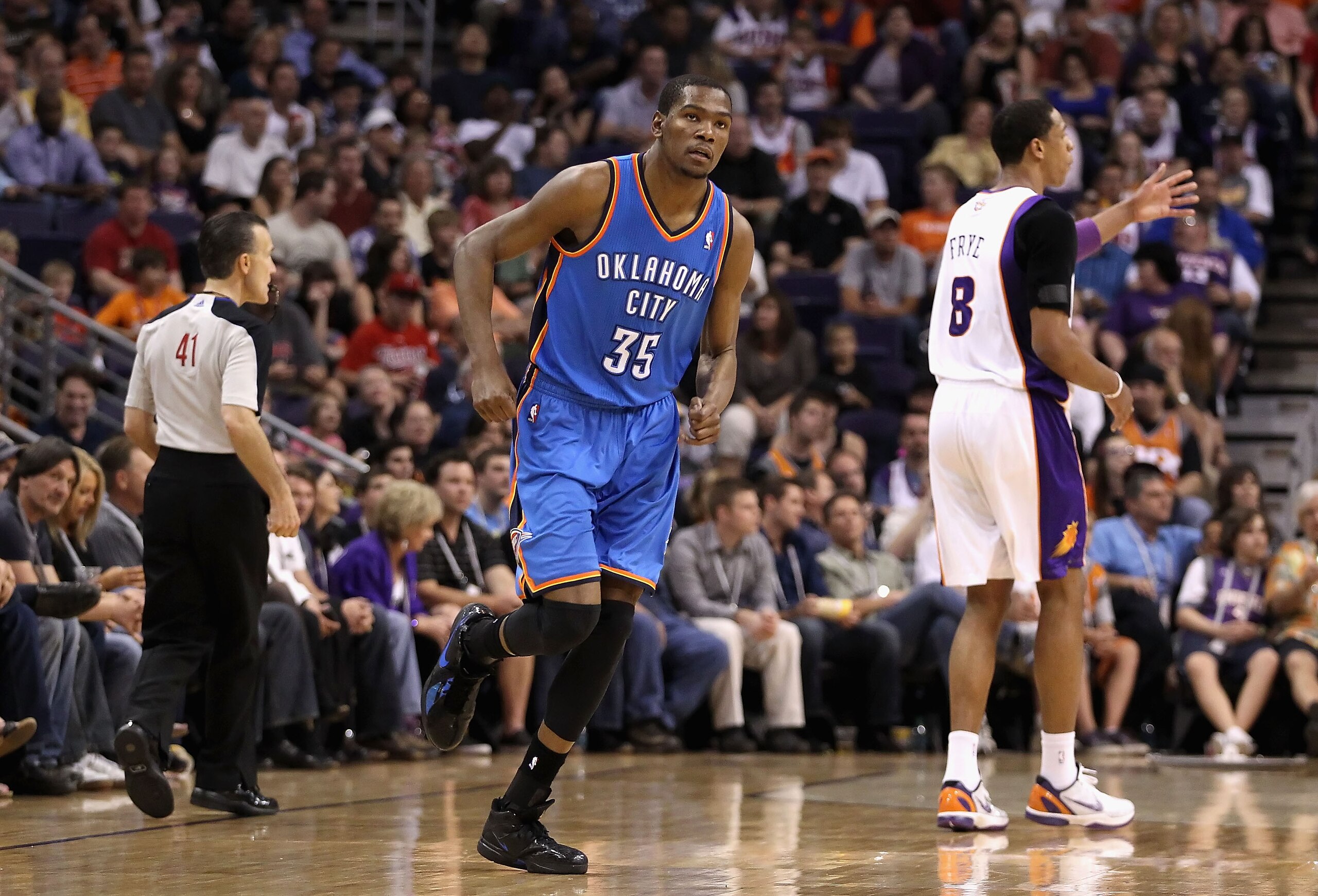 PHOENIX, AZ - MARCH 30:  Kevin Durant #35 of the Oklahoma City Thunder reacts after hitting a three point shot against the Phoenix Suns during the NBA game at US Airways Center on March 30, 2011 in Phoenix, Arizona.  The Thunder defeated the Suns 116-98.