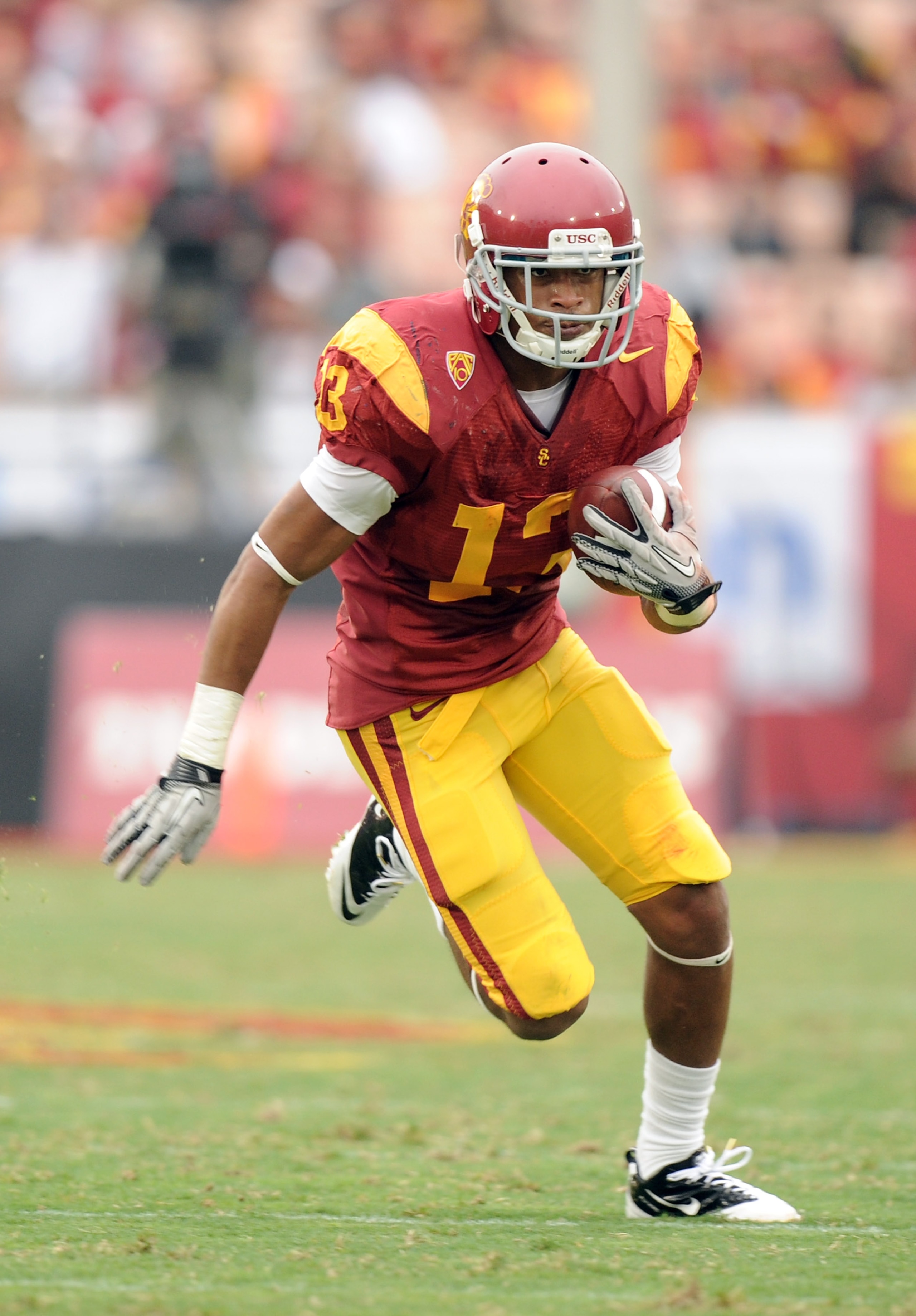LOS ANGELES, CA - OCTOBER 16: Robert Woods #13 of the USC Trojans carries the ball during the game against the California Golden Bears at Los Angeles Memorial Coliseum on October 16, 2010 in Los Angeles, California. (Photo by Harry How/Getty Images) LOS ANGELES, CA - OCTOBER 16: Robert Woods #13 of the USC Trojans carries the ball during the game against the California Golden Bears at Los Angeles Memorial Coliseum on October 16, 2010 in Los Angeles, California. (Photo by Harry How/Getty Images)