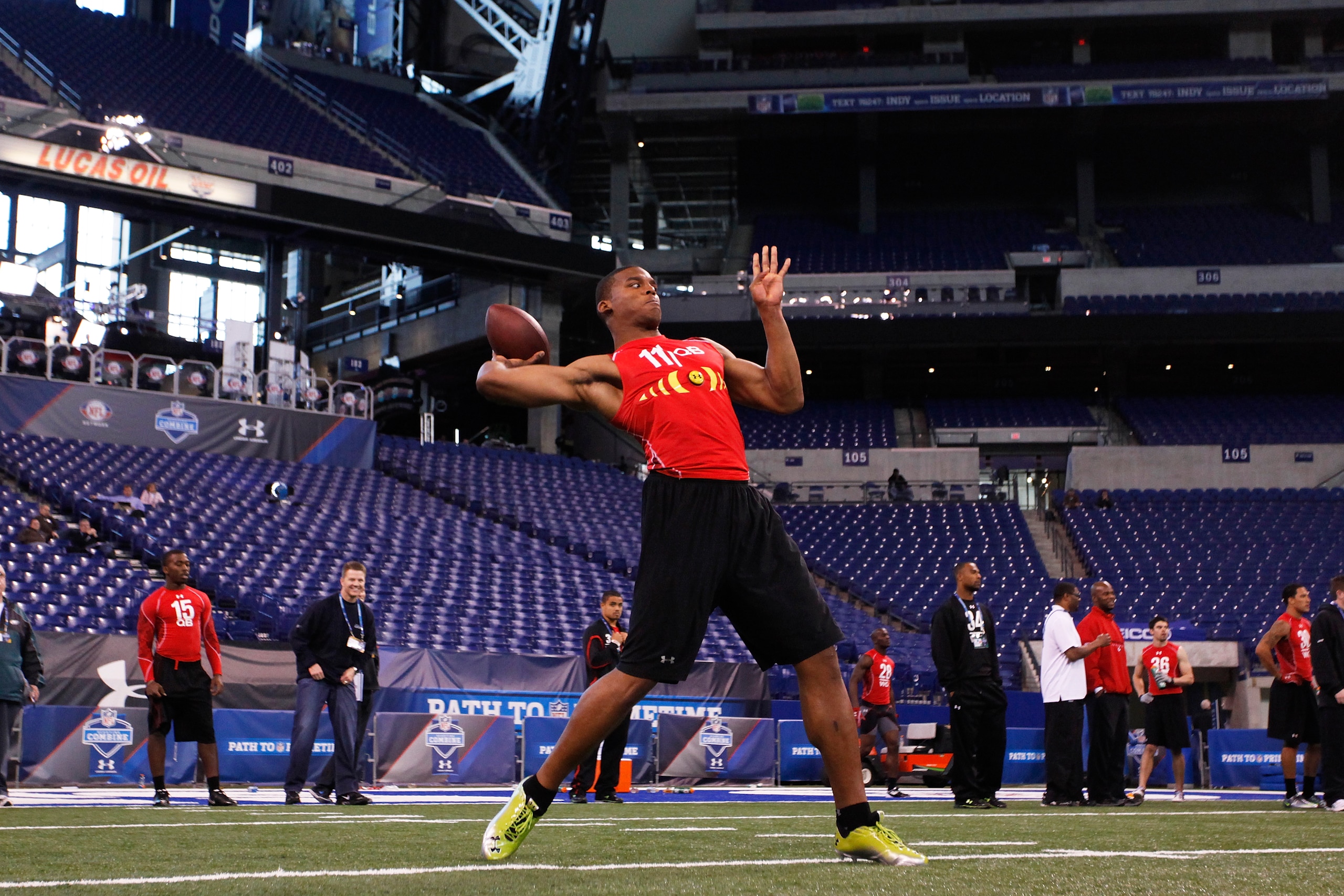 INDIANAPOLIS, IN - FEBRUARY 27: Cam Newton passes the ball during a drill at the 2011 NFL Scouting Combine at Lucas Oil Stadium on February 27, 2011 in Indianapolis, Indiana. (Photo by Joe Robbins/Getty Images) INDIANAPOLIS, IN - FEBRUARY 27: Cam Newton passes the ball during a drill at the 2011 NFL Scouting Combine at Lucas Oil Stadium on February 27, 2011 in Indianapolis, Indiana. (Photo by Joe Robbins/Getty Images)