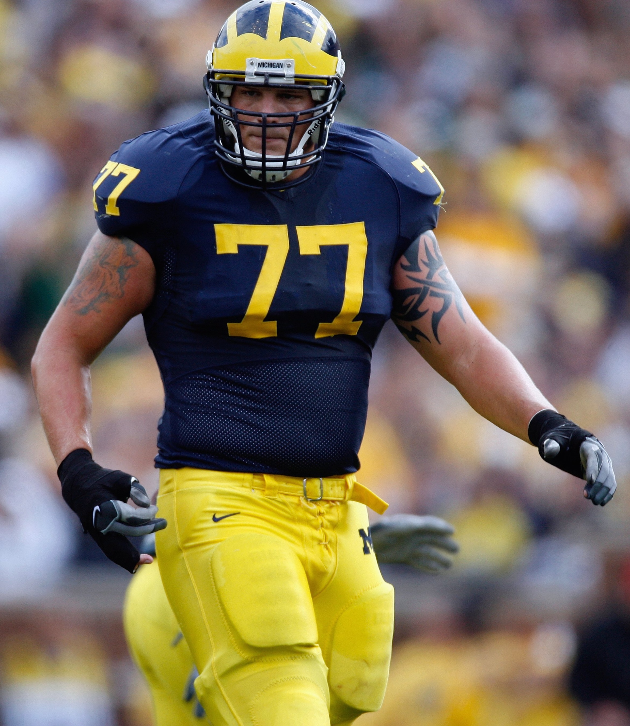 ANN ARBOR, MI - SEPTEMBER 15: Jake Long #77 of the Michigan Wolverines looks on during the game against the Notre Dame Fighting Irish on September 15, 2007 at Michigan Stadium in Ann Arbor, Michigan. Michigan won 38-0. (Photo by Gregory Shamus/Getty Imag ANN ARBOR, MI - SEPTEMBER 15: Jake Long #77 of the Michigan Wolverines looks on during the game against the Notre Dame Fighting Irish on September 15, 2007 at Michigan Stadium in Ann Arbor, Michigan. Michigan won 38-0. (Photo by Gregory Shamus/Getty Imag