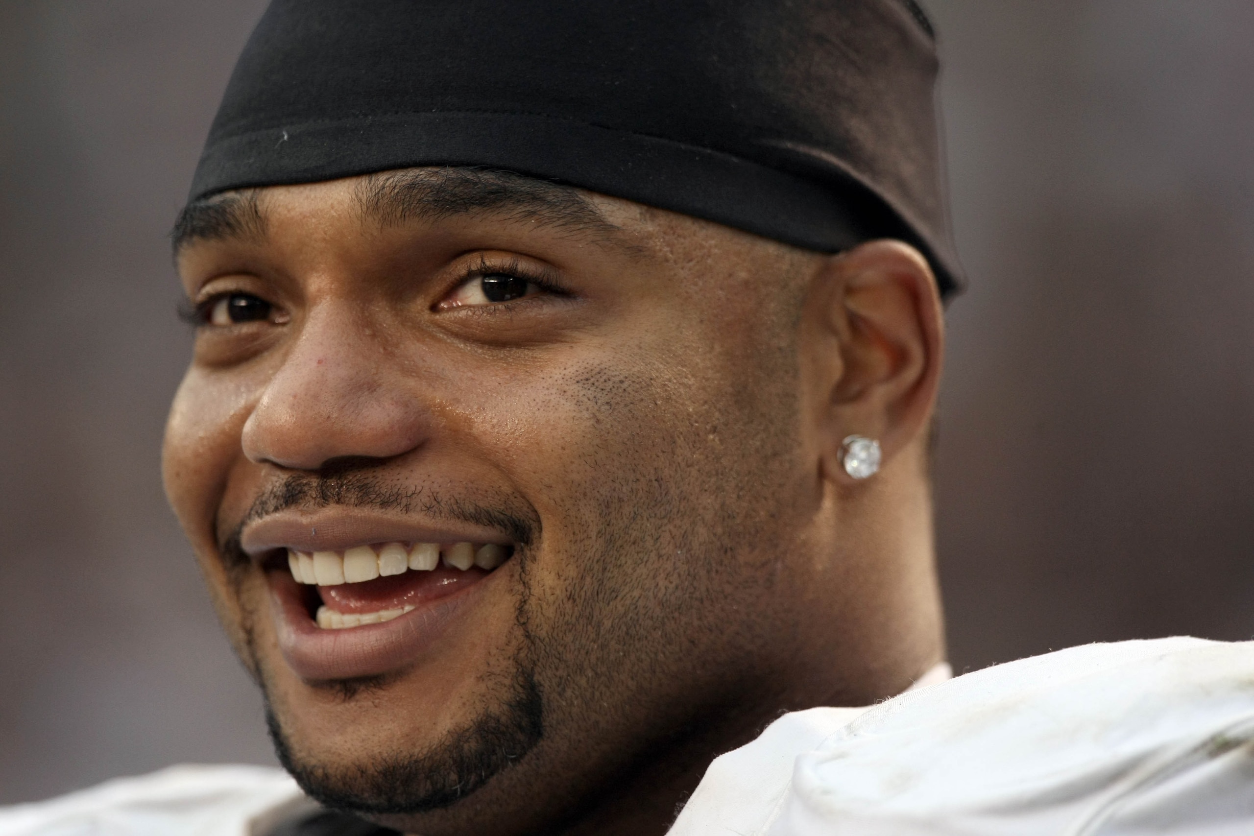 SAN DIEGO, CA - DECEMBER 5: Richard Seymour #92 of the Oakland Raiders smiles from the sidelines in the closing minutes of his team's 28-13 win over the San Diego Chargers during their NFL game at Qualcomm Stadium on December 5, 2010 in San Diego, Califor SAN DIEGO, CA - DECEMBER 5: Richard Seymour #92 of the Oakland Raiders smiles from the sidelines in the closing minutes of his team's 28-13 win over the San Diego Chargers during their NFL game at Qualcomm Stadium on December 5, 2010 in San Diego, Califor