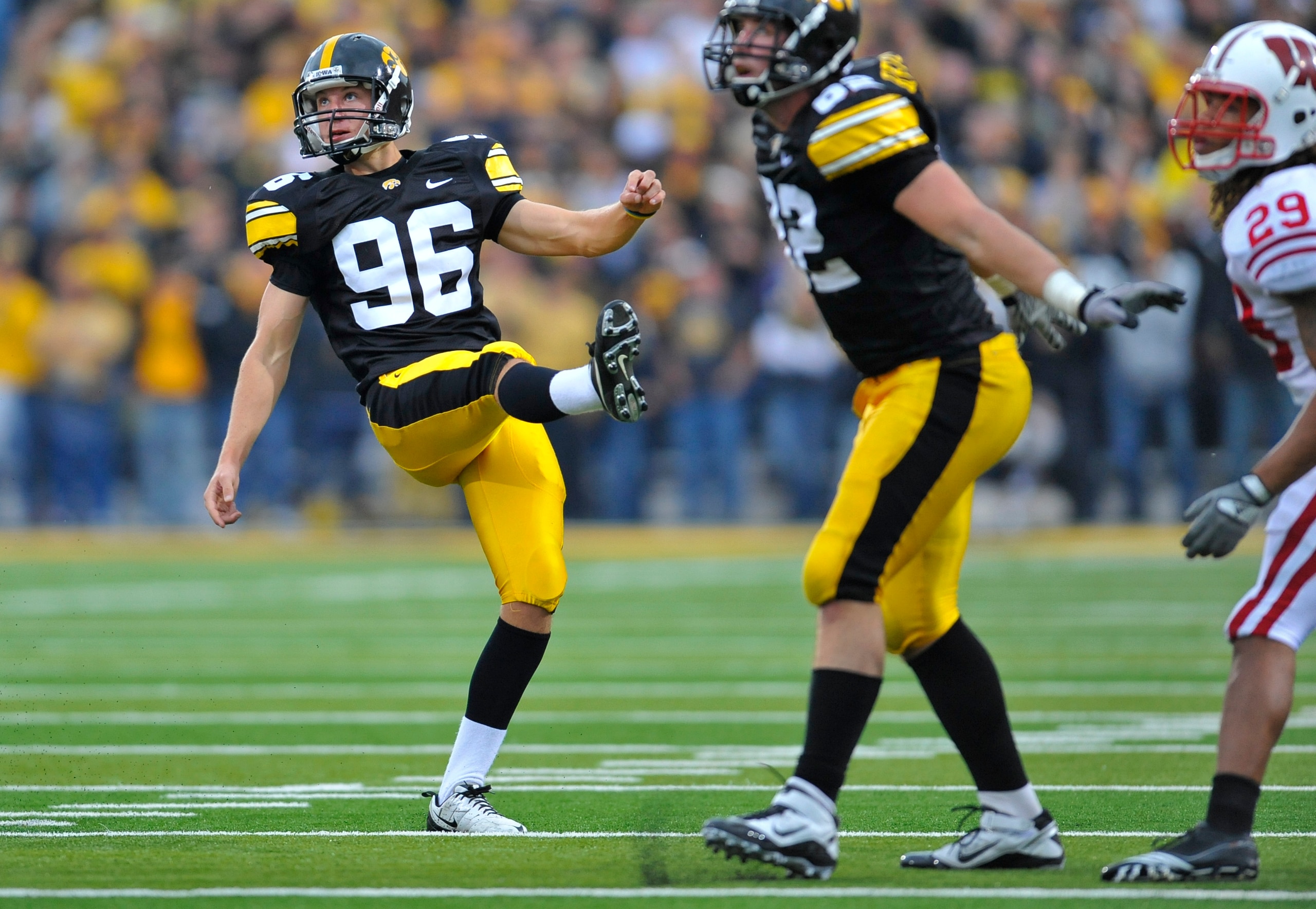 IOWA CITY, IA - OCTOBER 23- Kicker Mike Meyer #96 of the University of Iowa Hawkeyes watches his kick go through the uprights to score a field goal against the Wisconsin Badgers during the second half of play at Kinnick Stadium on October 23, 2010 in Iowa