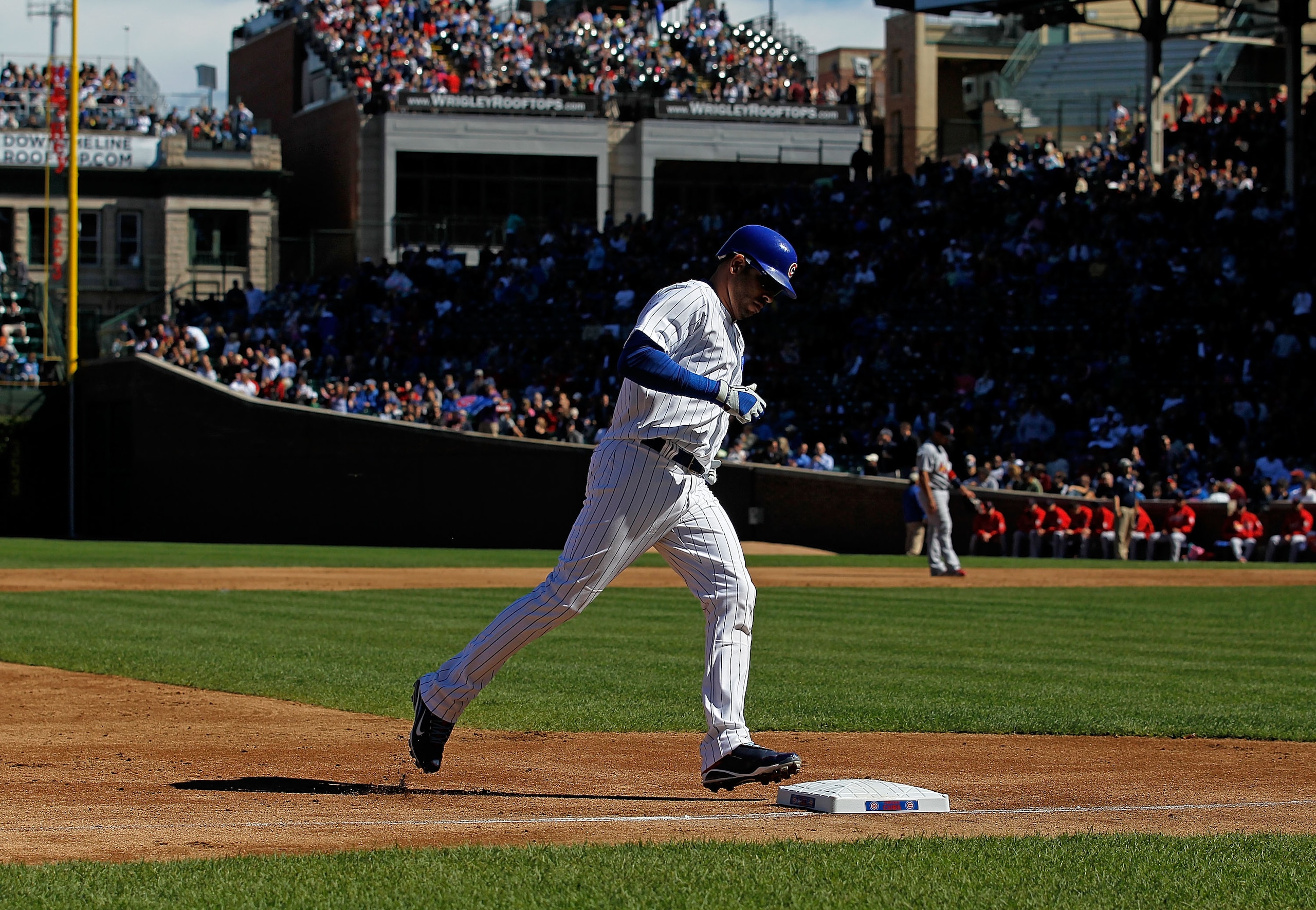 CHICAGO - SEPTEMBER 24: Aramis Ramirez #16 of the Chicago Cubs touches third base after hitting a solo home run in the 2nd inning against the St. Louis Cardinals at Wrigley Field on September 24, 2010 in Chicago, Illinois. (Photo by Jonathan Daniel/Getty