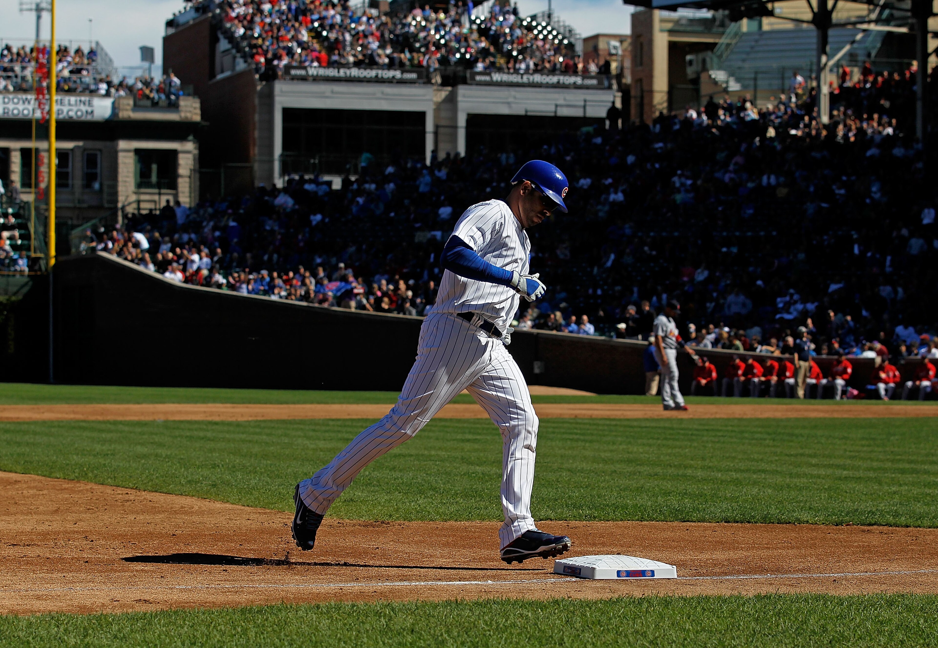 CHICAGO - SEPTEMBER 24: Aramis Ramirez #16 of the Chicago Cubs touches third base after hitting a solo home run in the 2nd inning against the St. Louis Cardinals at Wrigley Field on September 24, 2010 in Chicago, Illinois. (Photo by Jonathan Daniel/Getty