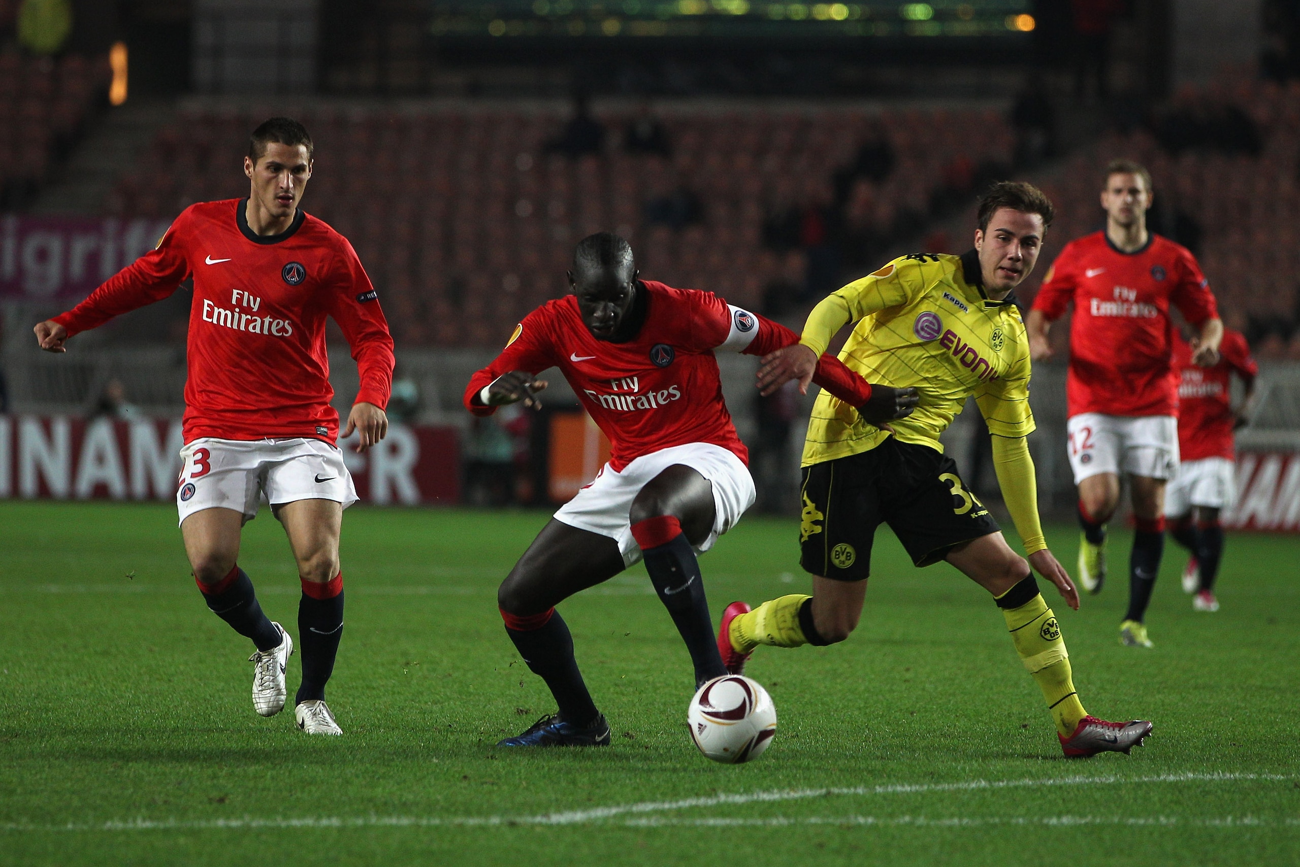PARIS - NOVEMBER 04: Mario Gotze (r) of Borussia challenged by Zoumana Camara of PSG during the UEFA Europa League Group J match between Paris Saint Germain and Borussia Dortmund at the Parc des Princes on November 4, 2010 in Paris, France. (Photo by Mi PARIS - NOVEMBER 04: Mario Gotze (r) of Borussia challenged by Zoumana Camara of PSG during the UEFA Europa League Group J match between Paris Saint Germain and Borussia Dortmund at the Parc des Princes on November 4, 2010 in Paris, France. (Photo by Mi