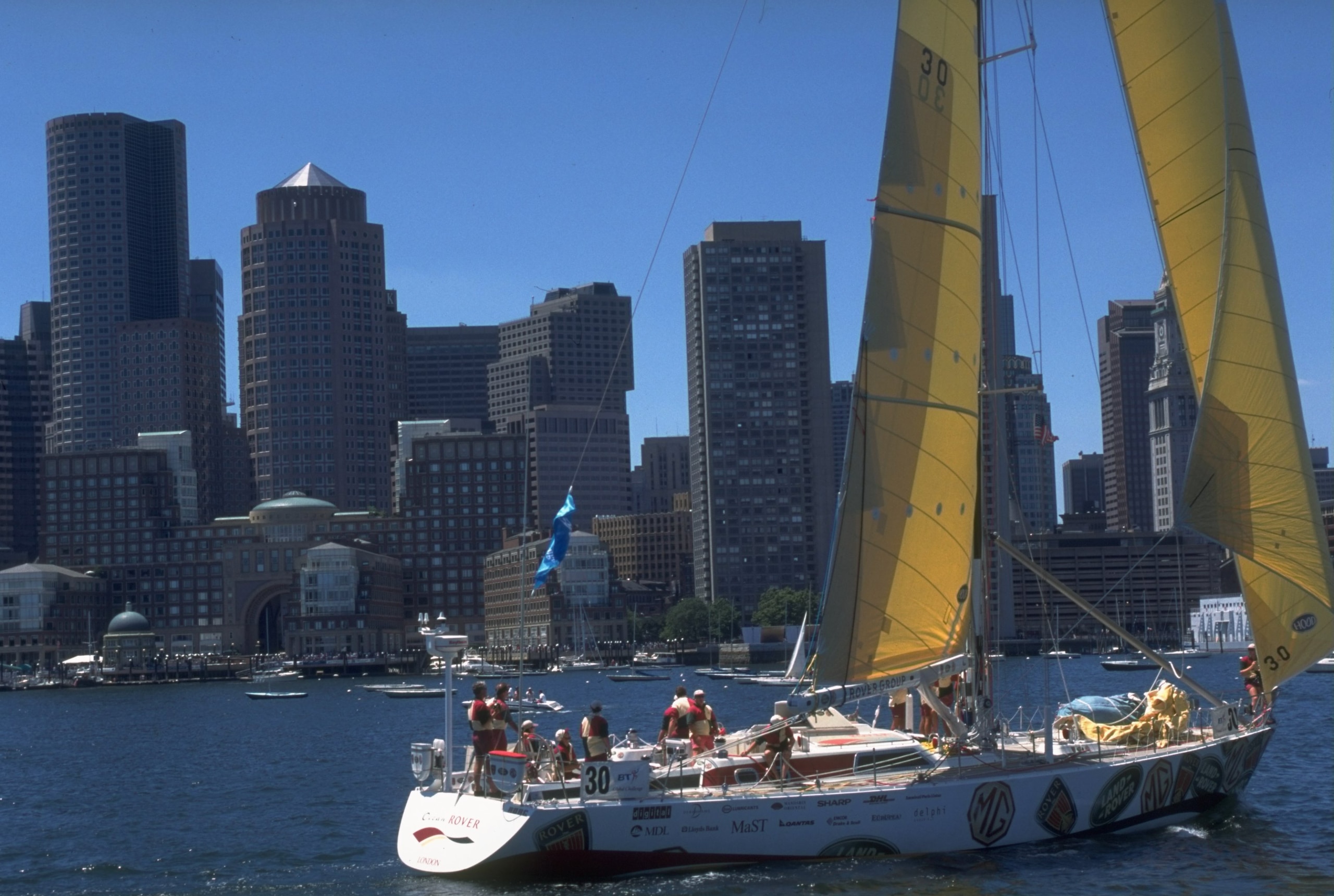 29 Jun 1997:  Ocean Rover sails by the Boston skyline prior to the start the start of the sixth and final leg of the BT Global Challenge from Boston, America to Southampton, England. \ Mandatory Credit: Stephen Munday /Allsport