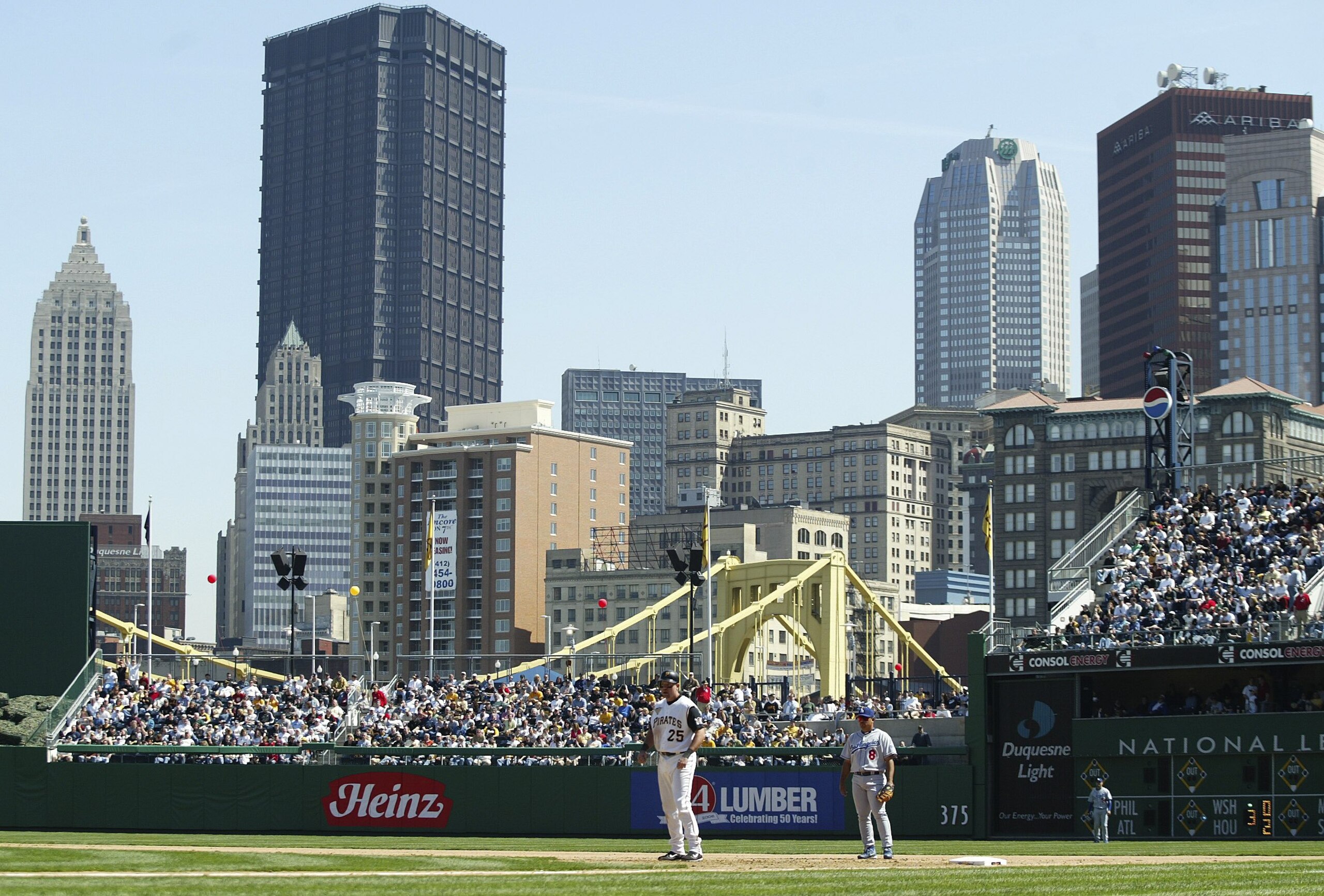 PITTSBURGH, PA- APRIL 10: A general view of the Pittsburgh skyline with Olmedo Saenz #8 of the Los Angeles Dodgers and Sean Casey #25 of the Pittsburgh Pirates on the field on April 10, 2006 at PNC Park in Pittsburgh, Pennsylvania. (Photo by Rick Stewart/