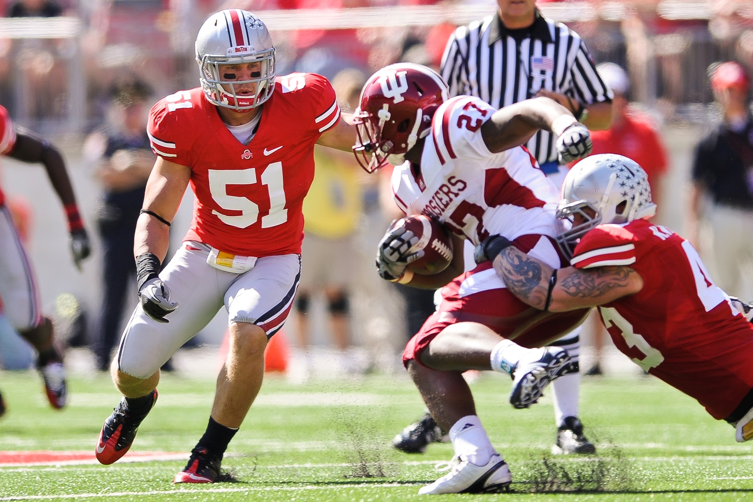 COLUMBUS, OH - OCTOBER 9: Ross Homan #51 of the Ohio State Buckeyes moves in to assist on a tackle against the Indiana Hoosiers at Ohio Stadium on October 9, 2010 in Columbus, Ohio. (Photo by Jamie Sabau/Getty Images) COLUMBUS, OH - OCTOBER 9: Ross Homan #51 of the Ohio State Buckeyes moves in to assist on a tackle against the Indiana Hoosiers at Ohio Stadium on October 9, 2010 in Columbus, Ohio. (Photo by Jamie Sabau/Getty Images)