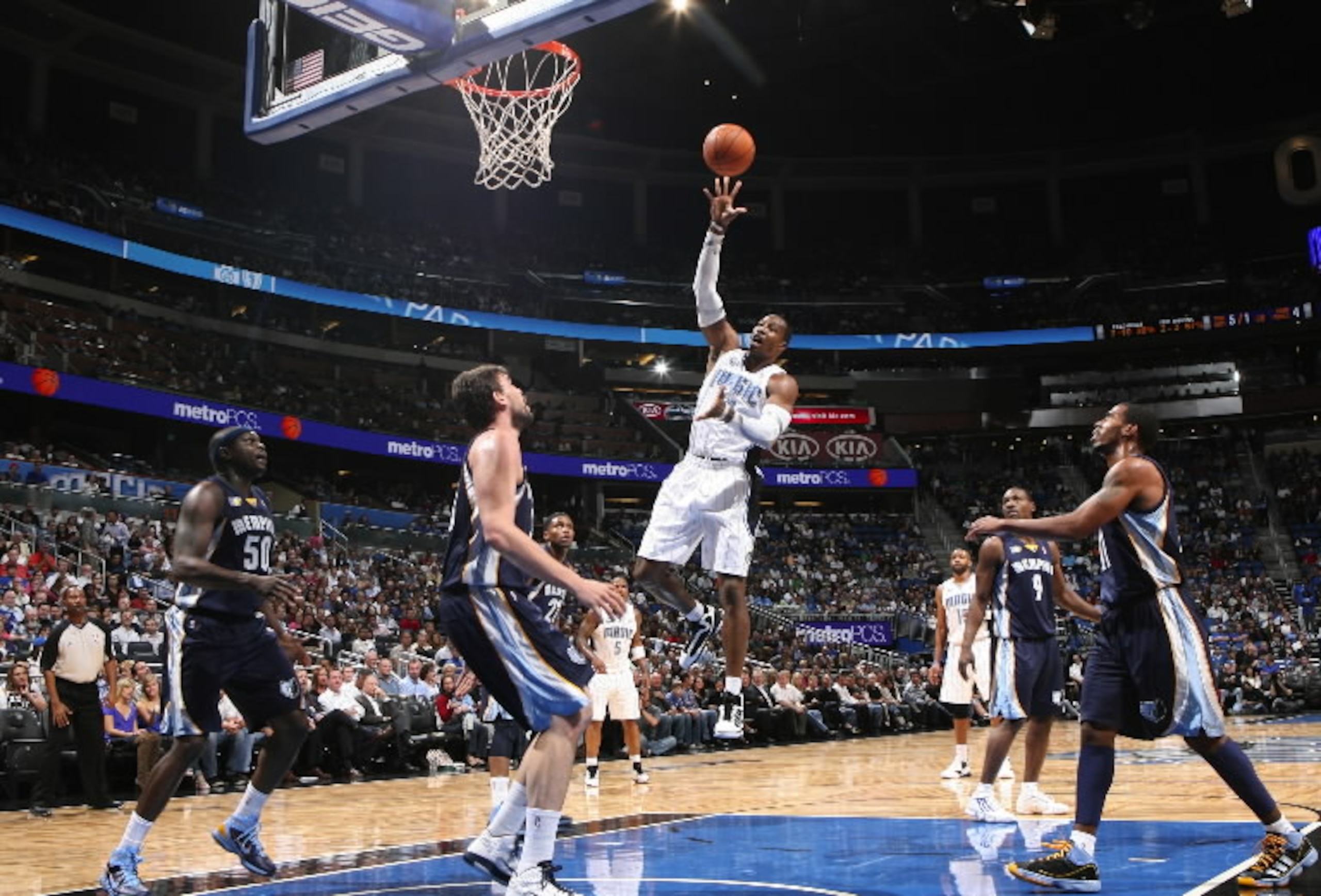 Dwight Howard shooting his baby hook shot over the Memphis Grizzlies burly big man Marc Gasol. Dwight Howard shooting his baby hook shot over the Memphis Grizzlies burly big man Marc Gasol.