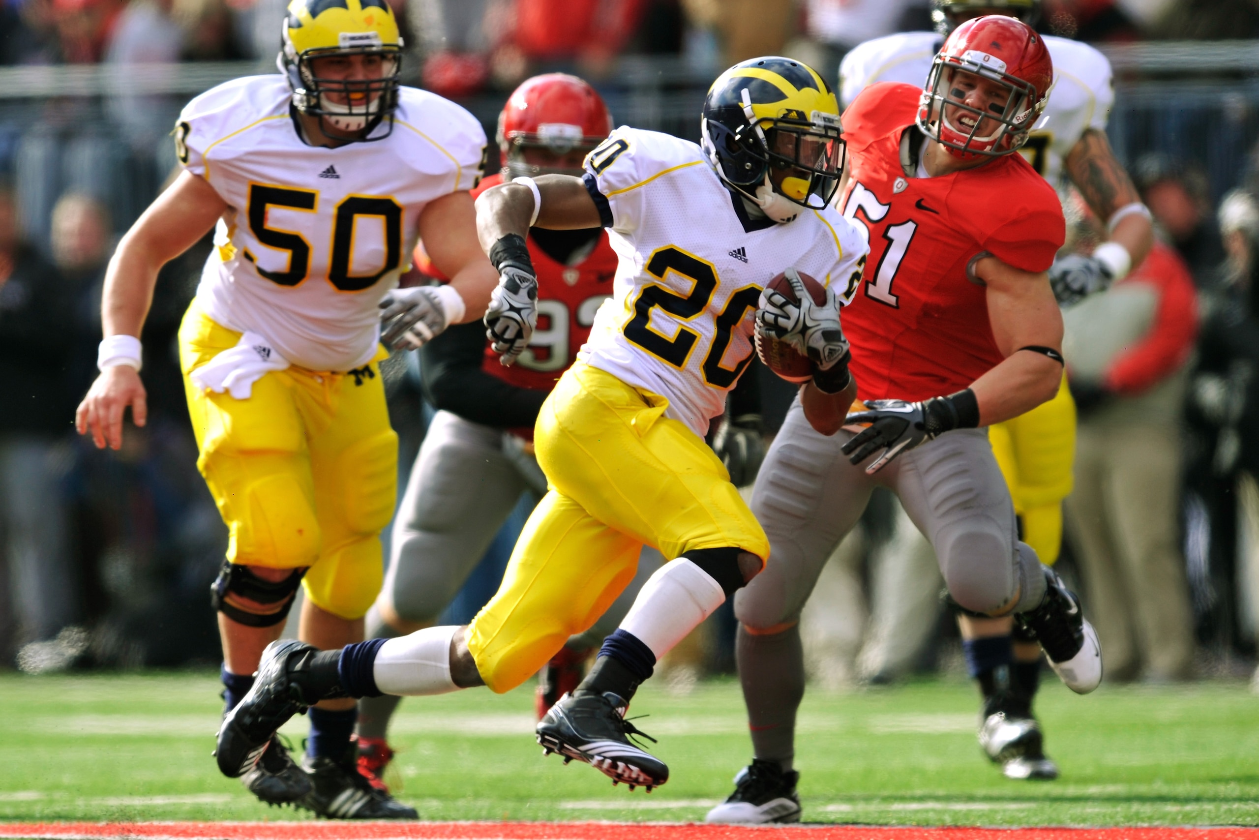 COLUMBUS, OH - NOVEMBER 27: Michael Shaw #20 of the Michigan Wolverines takes off downfield for a gain against the Ohio State Buckeyes in the first quarter at Ohio Stadium on November 27, 2010 in Columbus, Ohio. (Photo by Jamie Sabau/Getty Images) COLUMBUS, OH - NOVEMBER 27: Michael Shaw #20 of the Michigan Wolverines takes off downfield for a gain against the Ohio State Buckeyes in the first quarter at Ohio Stadium on November 27, 2010 in Columbus, Ohio. (Photo by Jamie Sabau/Getty Images)
