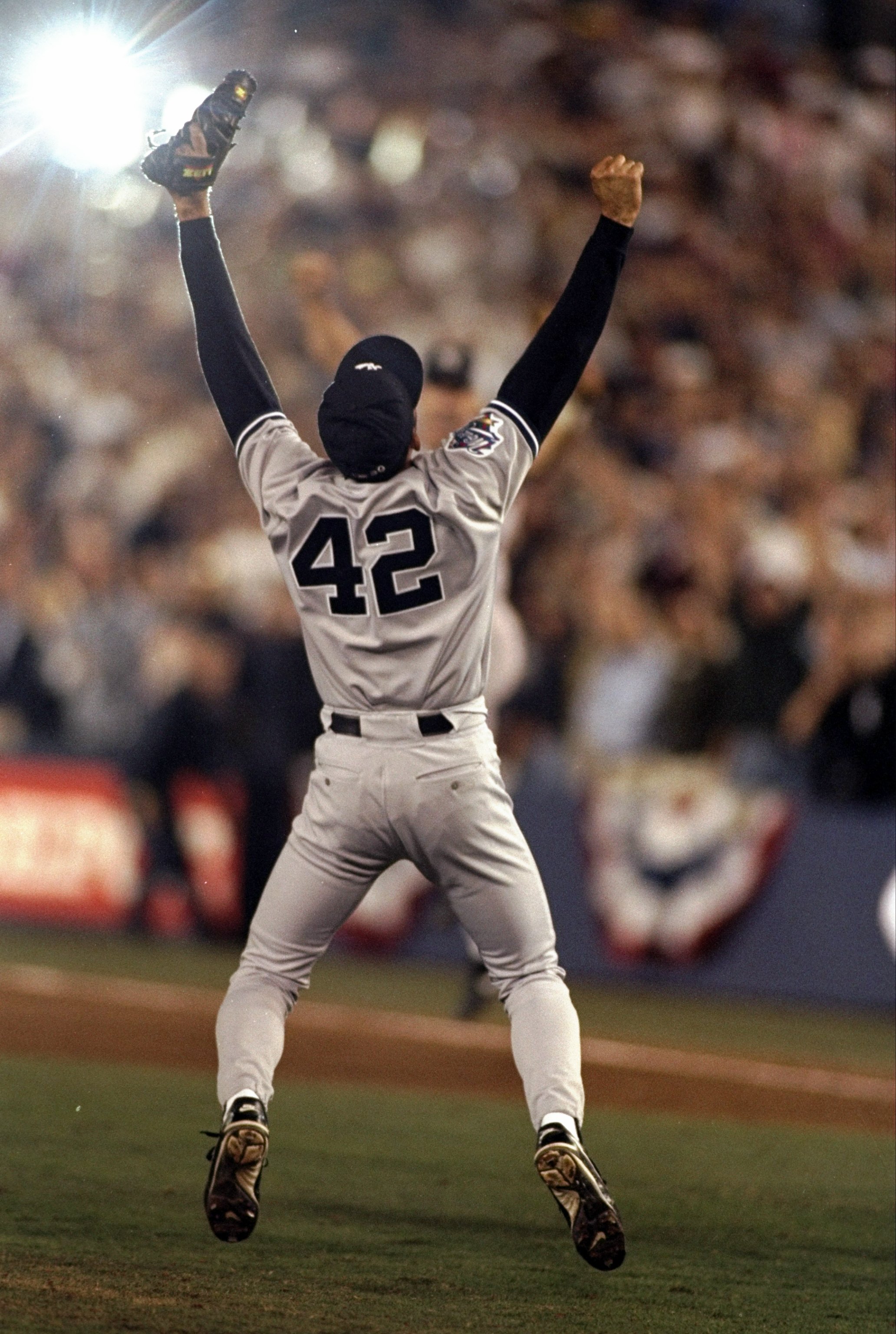 21 Oct 1998:  Pitcher Mariano Rivera #42 of the New York Yankees celebrates following the 1998 World Series Game 5 against the San Diego Padres at the Qualcomm Stadium in San Diego, California. The Yankees defeated the Padres 3-0 to win the World Series.