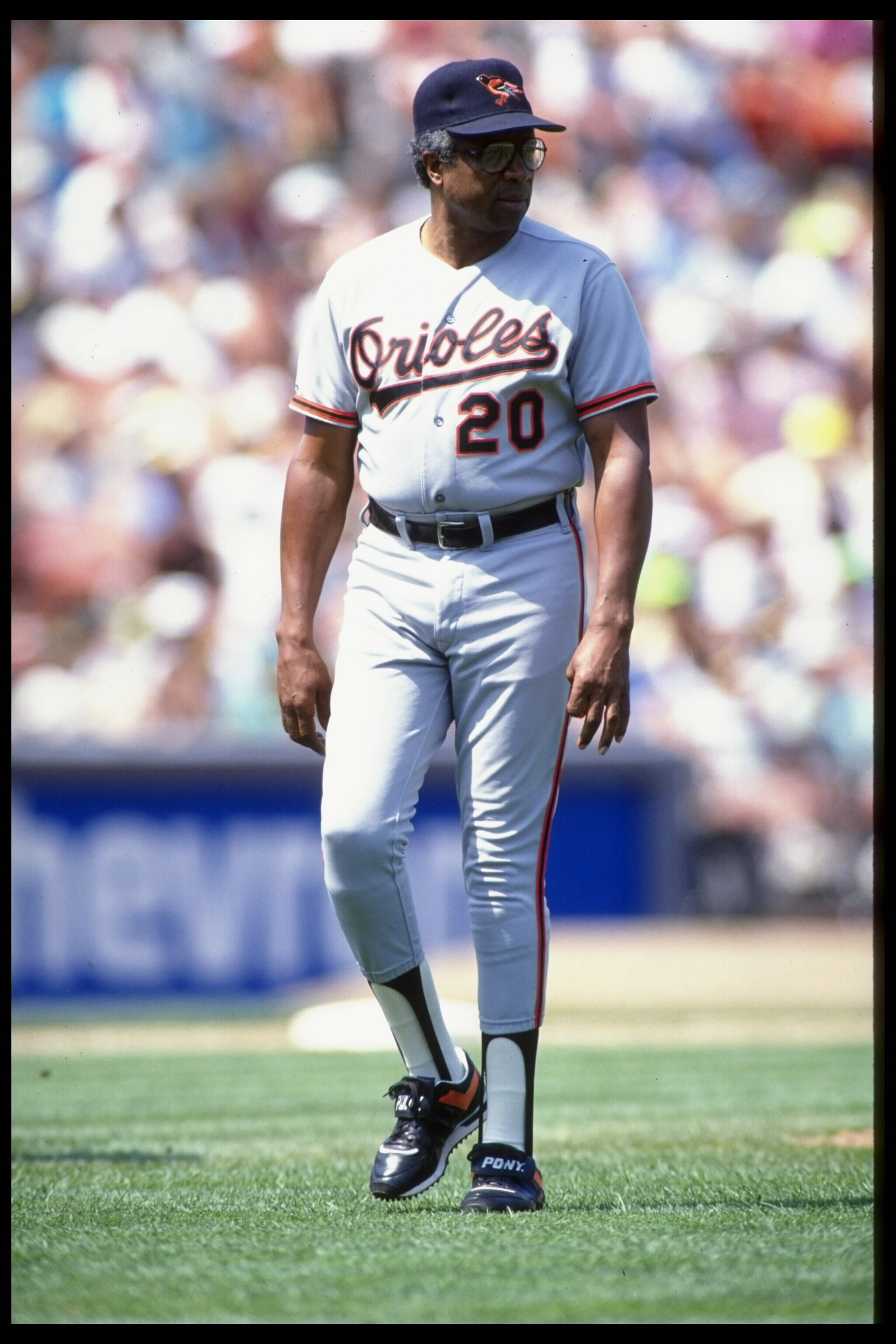 1990:  Head coach Frank Robinson of the Baltimore Orioles walks off the field following a pitching change made during an Orioles game in the 1990 season.  Mandatory Credit:  Otto Greule/ Allsport USA