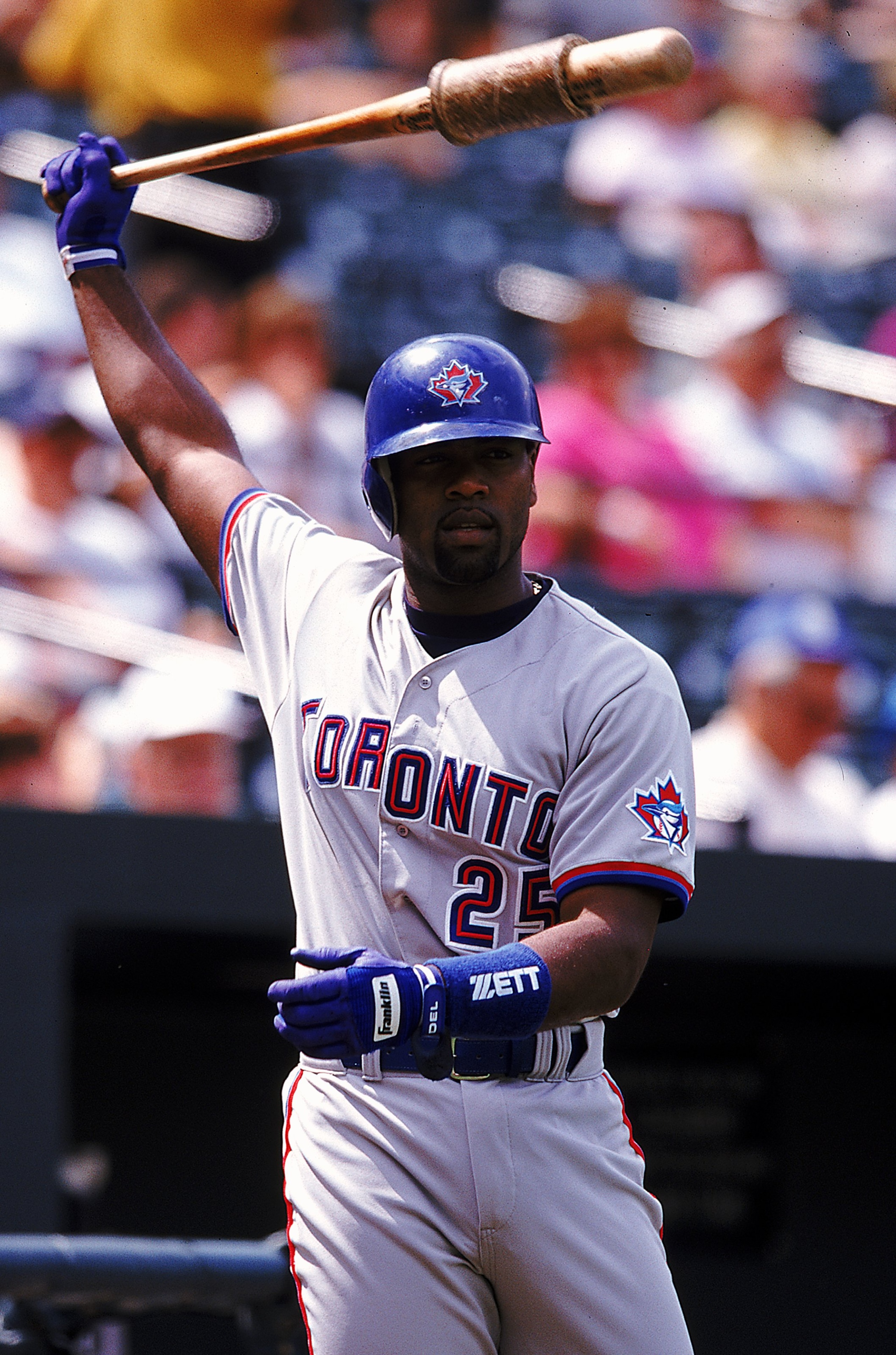 8 Jul 1999: Carlos Delgado #25of the Toronto Blue Jays swings the bat as he warms up during the game against the Baltimore Orioles at Camden Yards in Baltimore, Maryland. The Blue Jays defeated the Orioles 11-6.