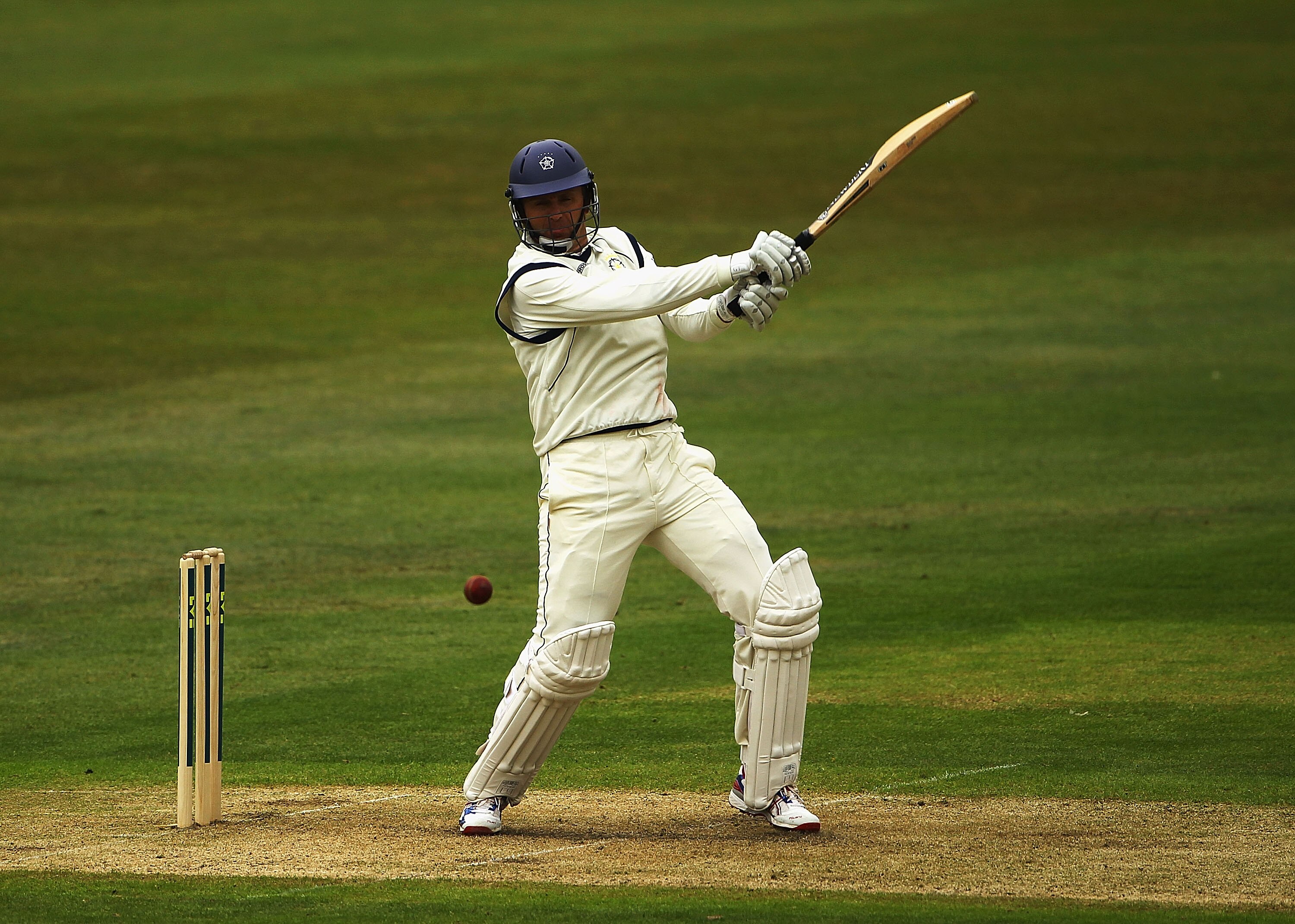 NOTTINGHAM, ENGLAND - APRIL 14:  Dominic Cork of Hampshire hits the ball towards the boundary during the  LV County Championship Division One match between Nottinghamshire and Hampshire at Trent Bridge on April 14, 2011 in Nottingham, England.  (Photo by