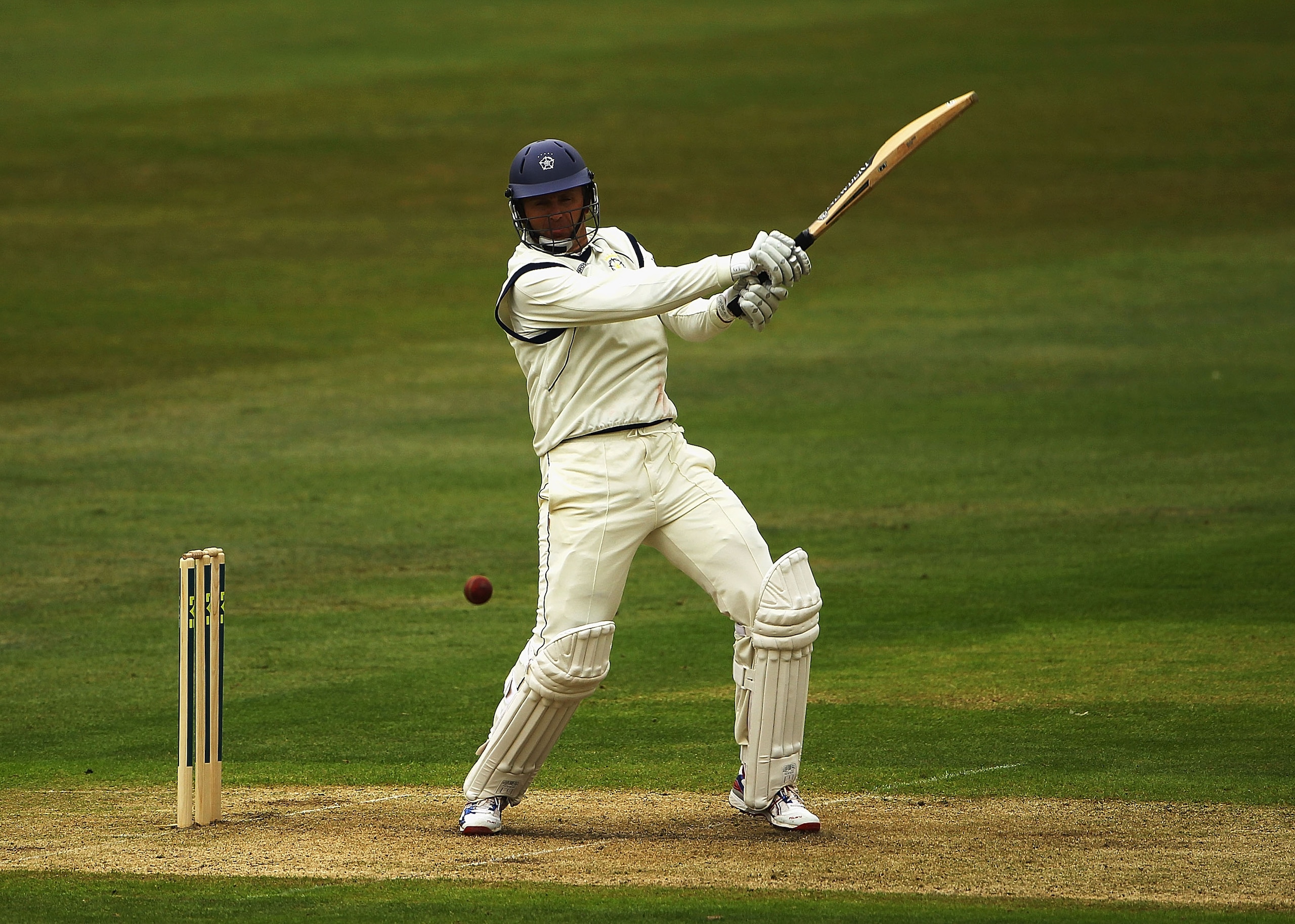 NOTTINGHAM, ENGLAND - APRIL 14:  Dominic Cork of Hampshire hits the ball towards the boundary during the  LV County Championship Division One match between Nottinghamshire and Hampshire at Trent Bridge on April 14, 2011 in Nottingham, England.  (Photo by