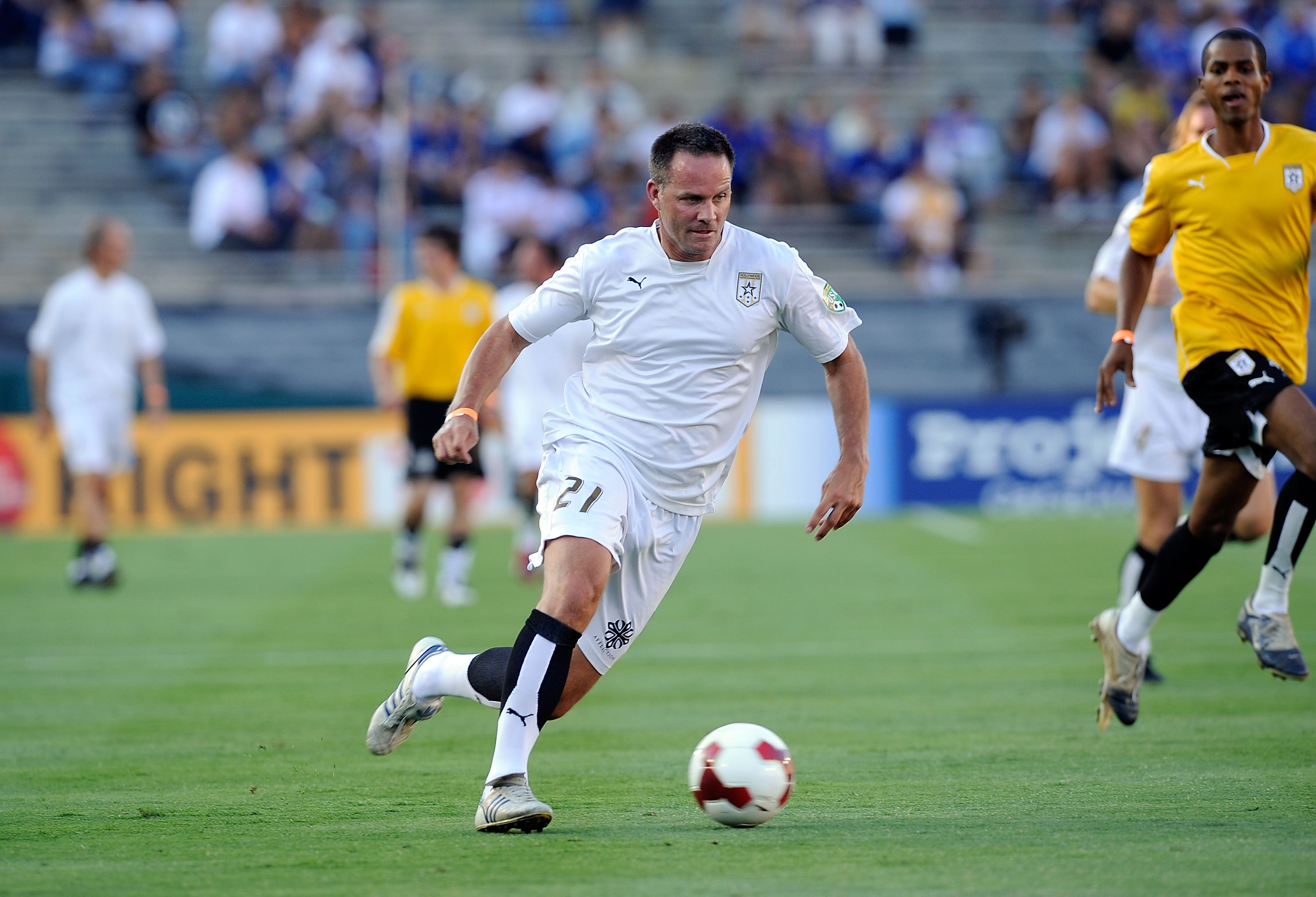 PASADENA, CA - JULY 21:  Former USNational team footballer Eric Wynalda paces the ball on the attack during a soccer celebrity game prior to the World Football Challenge between Chelsea FC and Inter Milan at the Rose Bowl on July 21, 2009 in Pasadena, Cal