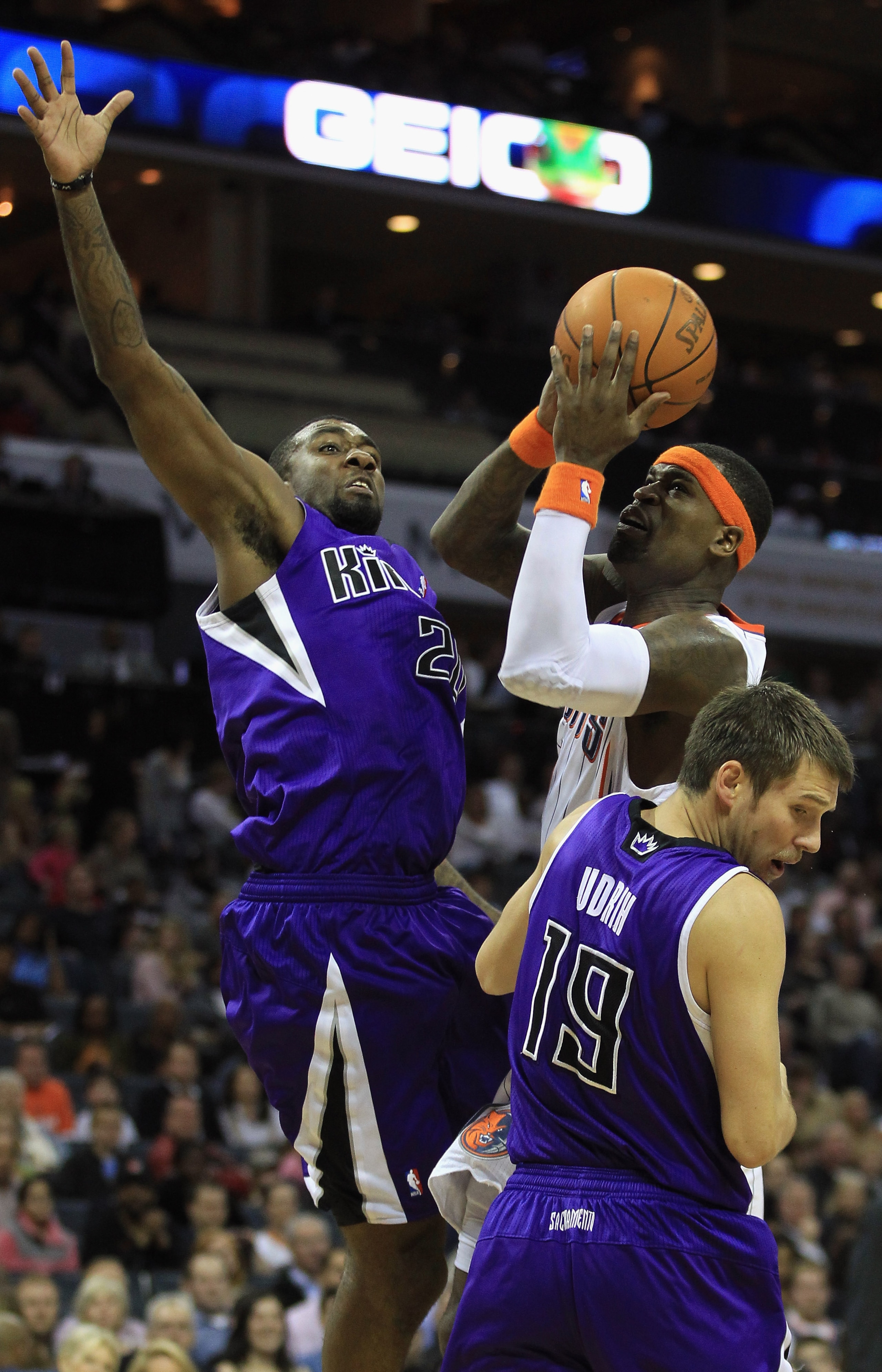 CHARLOTTE, NC - FEBRUARY 25:  Teammates Donte Greene #20 and Beno Udrih #19 of the Sacramento Kings try to stop Stephen Jackson #1 of the Charlotte Bobcats during their game at Time Warner Cable Arena on February 25, 2011 in Charlotte, North Carolina. NOT