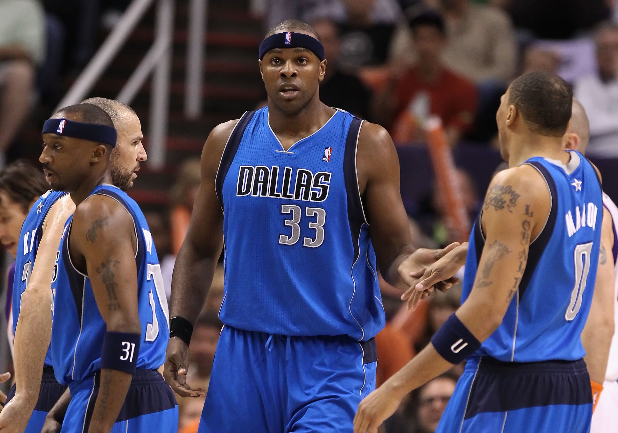 PHOENIX, AZ - FEBRUARY 17:  Brendan Haywood #33 of the Dallas Mavericks high fives teammates after scoring against the Phoenix Suns during the NBA game at US Airways Center on February 17, 2011 in Phoenix, Arizona.  NOTE TO USER: User expressly acknowledg