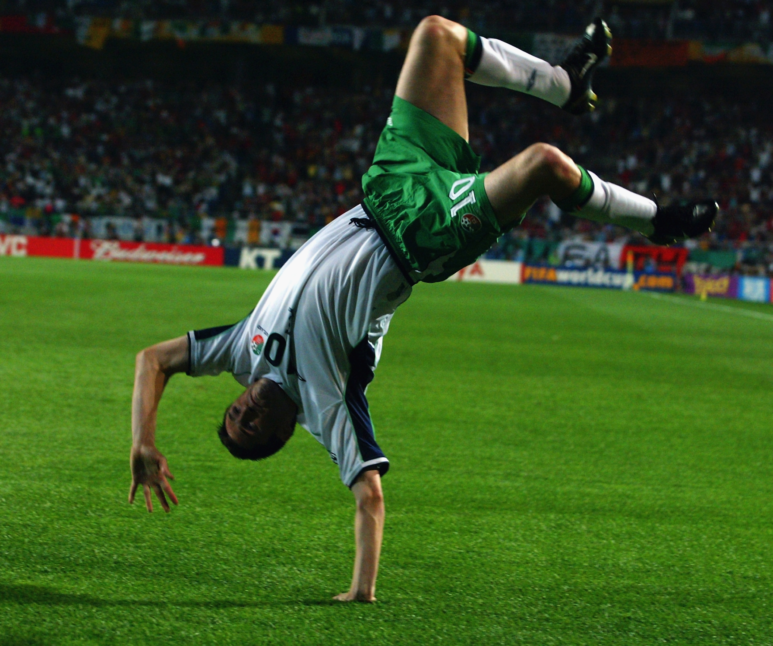 SUWON - JUNE 16:  Robbie Keane of the Republic of Ireland celebrates scoring a dramatic penalty kick during the FIFA World Cup Finals 2002 Second Round match between Spain and Republic of Ireland played at the Suwon World Cup Stadium, in Suwon, South Kore