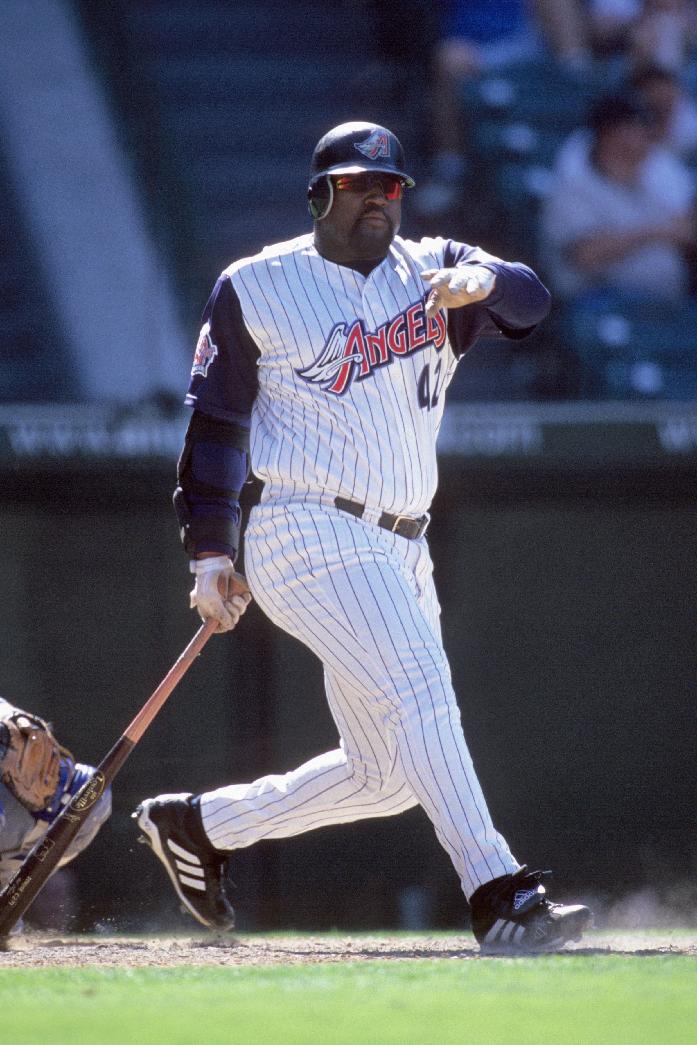 ANAHEIM, CA - JUNE 3:  Mo Vaughn #42 of the Anaheim Angels bats during the game against the Los Angeles Dodgers at Edison International Field on June 3, 2000 in Anaheim, California. (Photo by Harry How/Getty Images)