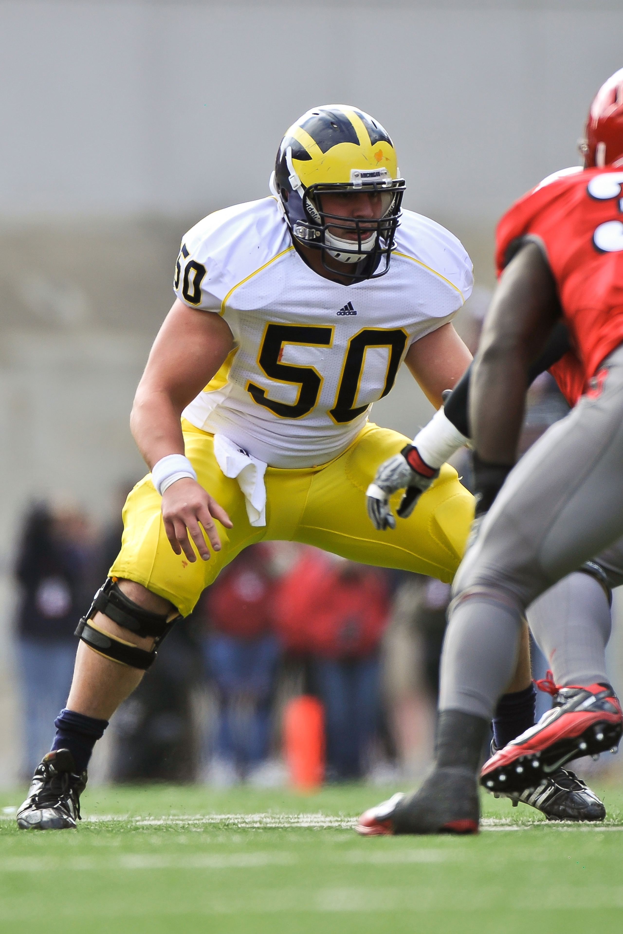 COLUMBUS, OH - NOVEMBER 27: David Molk #50 of the Michigan Wolverines blocks against the Ohio State Buckeyes at Ohio Stadium on November 27, 2010 in Columbus, Ohio. (Photo by Jamie Sabau/Getty Images) COLUMBUS, OH - NOVEMBER 27: David Molk #50 of the Michigan Wolverines blocks against the Ohio State Buckeyes at Ohio Stadium on November 27, 2010 in Columbus, Ohio. (Photo by Jamie Sabau/Getty Images)
