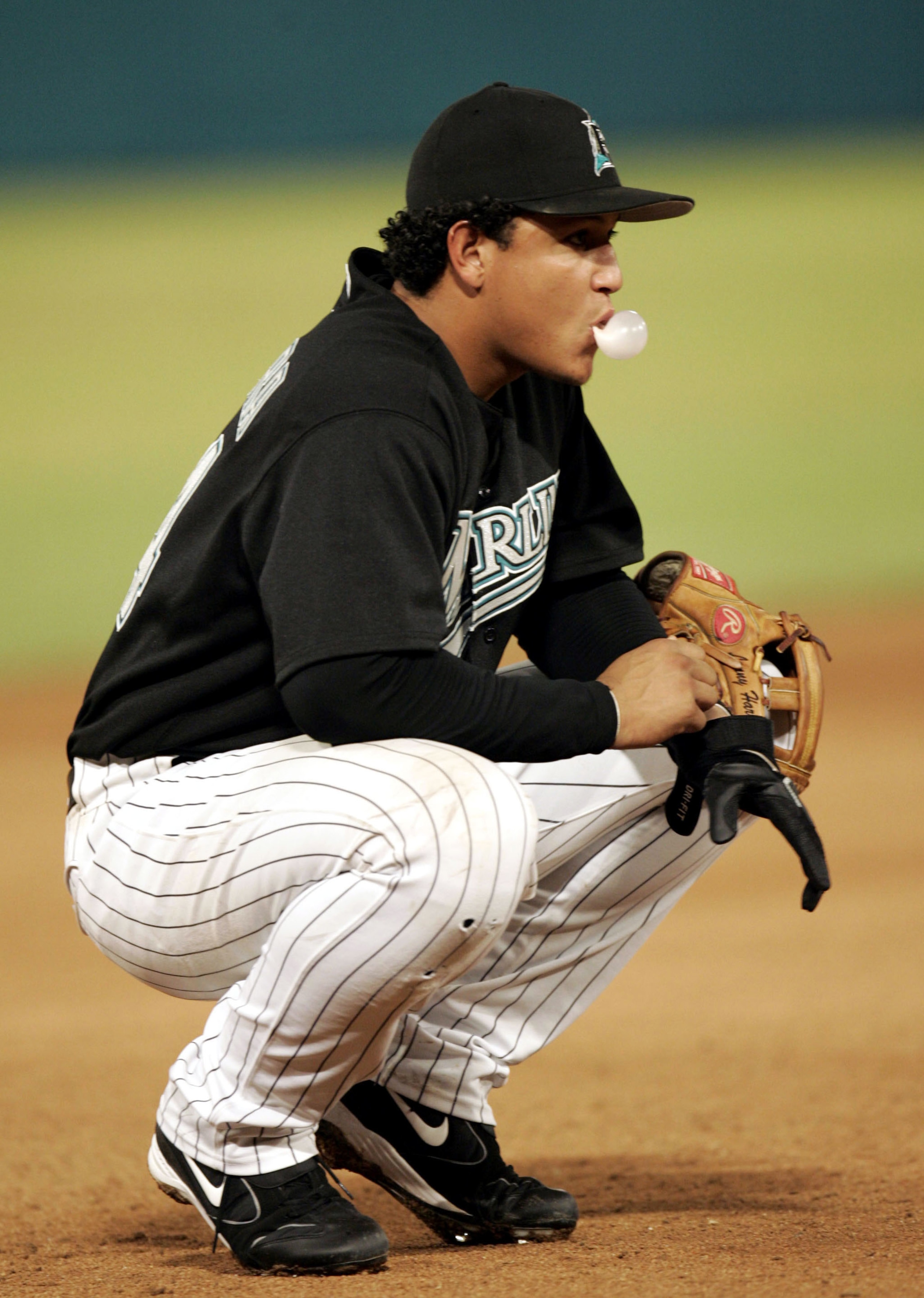 MIAMI - SEPTEMBER 16:  Third basemen Miguel Cabrera #24 of the Florida Marlins blows a bubble with his gum during a break in the action against the Philadelphia Phillies on September 16, 2005 at Dolphins Stadium in Miami, Florida. The Phillies defeated th