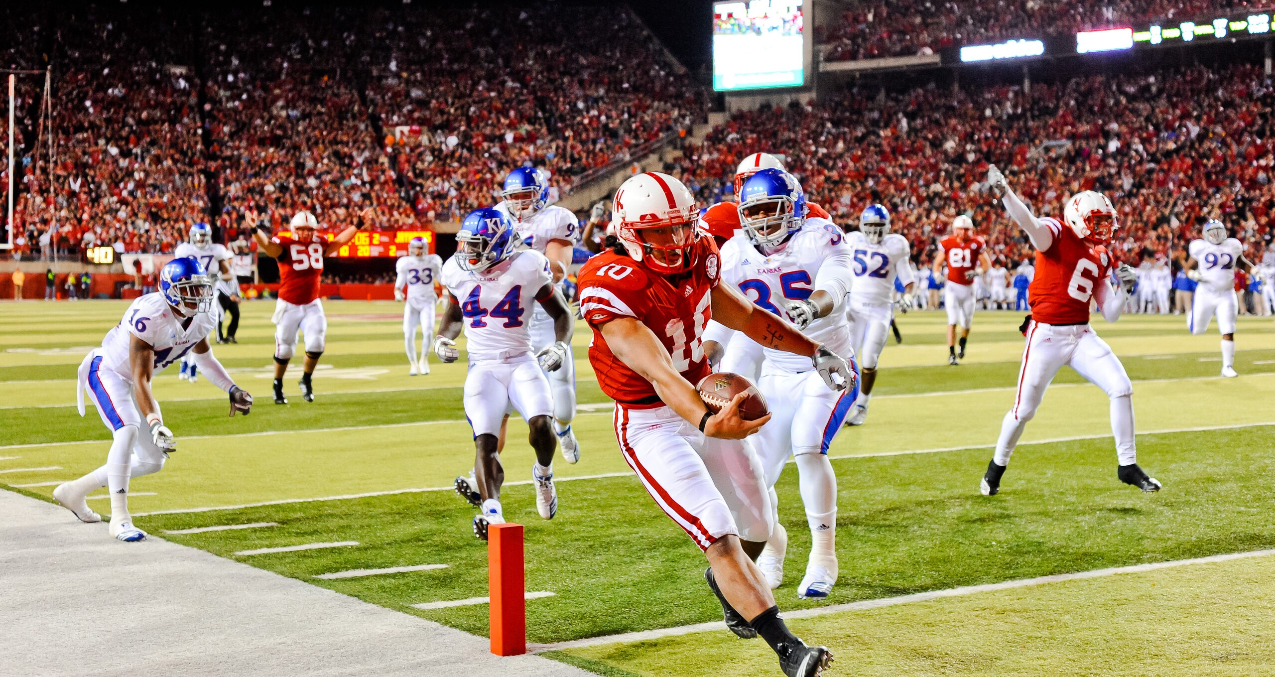 LINCOLN, NE - NOVEMBER 13: Roy Helu Jr. #10 of the Nebraska Cornhuskers runs for the endzone the Kansas Jayhawks during their game at Memorial Stadium on November 13, 2010 in Lincoln, Nebraska. Nebraska Defeated Kansas 20-3. (Photo by Eric Francis/Getty I LINCOLN, NE - NOVEMBER 13: Roy Helu Jr. #10 of the Nebraska Cornhuskers runs for the endzone the Kansas Jayhawks during their game at Memorial Stadium on November 13, 2010 in Lincoln, Nebraska. Nebraska Defeated Kansas 20-3. (Photo by Eric Francis/Getty I