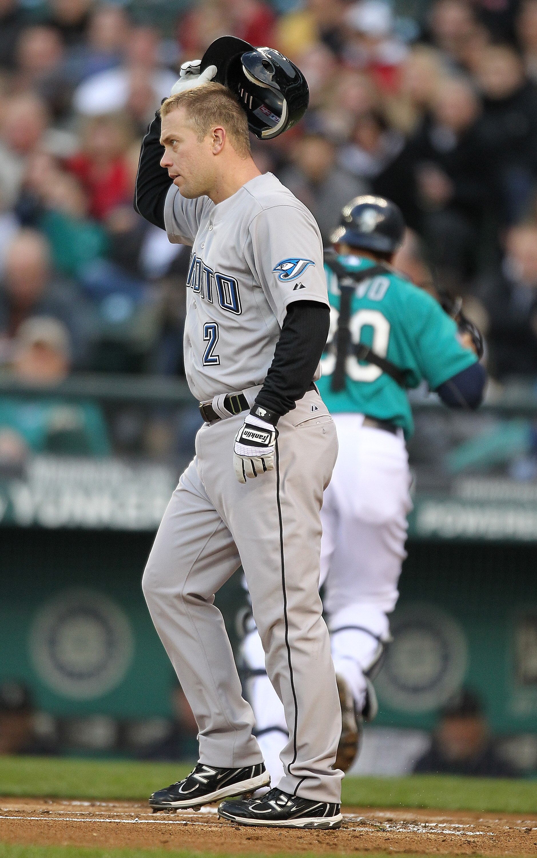 SEATTLE - APRIL 11:  Aaron Hill #2 of the Toronto Blue Jays is called out on strikes in the first inning against the Seattle Mariners at Safeco Field on April 11, 2011 in Seattle, Washington. (Photo by Otto Greule Jr/Getty Images)