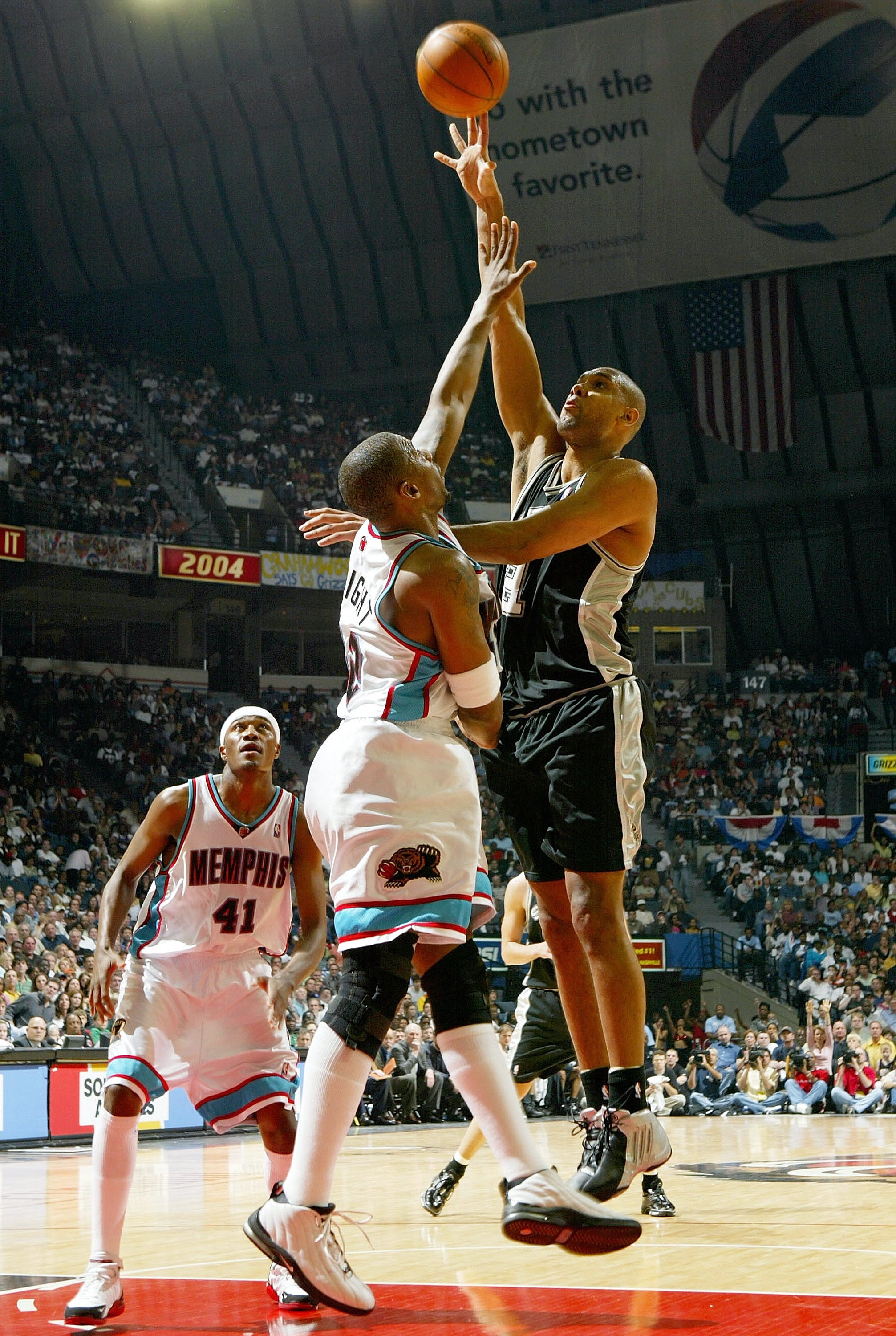 MEMPHIS, TN - APRIL 25:  Tim Duncan #21 of San Antonio Spurs puts up a shot over Lorenzen Wright #42 of the Memphis Grizzlies during Game four of Western Conference Quarterfinals of the 2004 NBA Playoffs April 25, 2004 at The Pyramid in Memphis Tennessee.