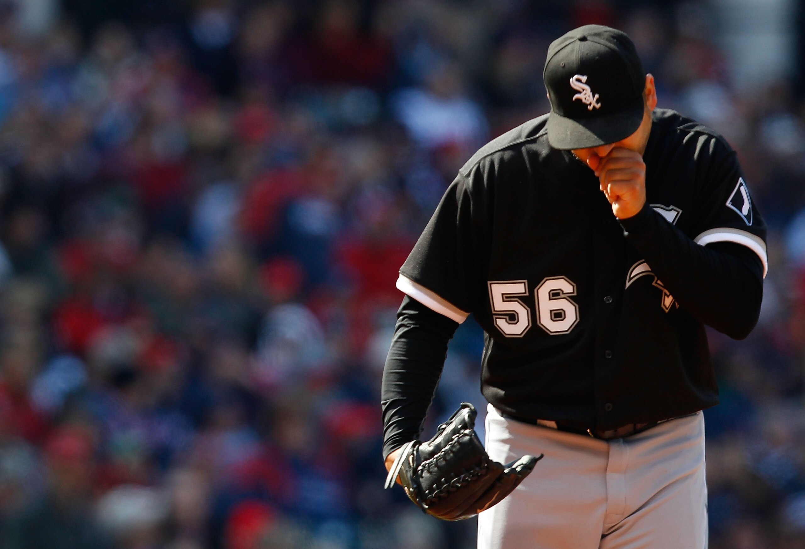 CLEVELAND - APRIL 01: Mark Buehrle #56 of the Chicago White Sox warms his hands during the Opening Day game against the Cleveland Indians on April 1, 2011 at Progressive Field in Cleveland, Ohio. The high temperature in Cleveland only reached 44 degrees. CLEVELAND - APRIL 01: Mark Buehrle #56 of the Chicago White Sox warms his hands during the Opening Day game against the Cleveland Indians on April 1, 2011 at Progressive Field in Cleveland, Ohio. The high temperature in Cleveland only reached 44 degrees.