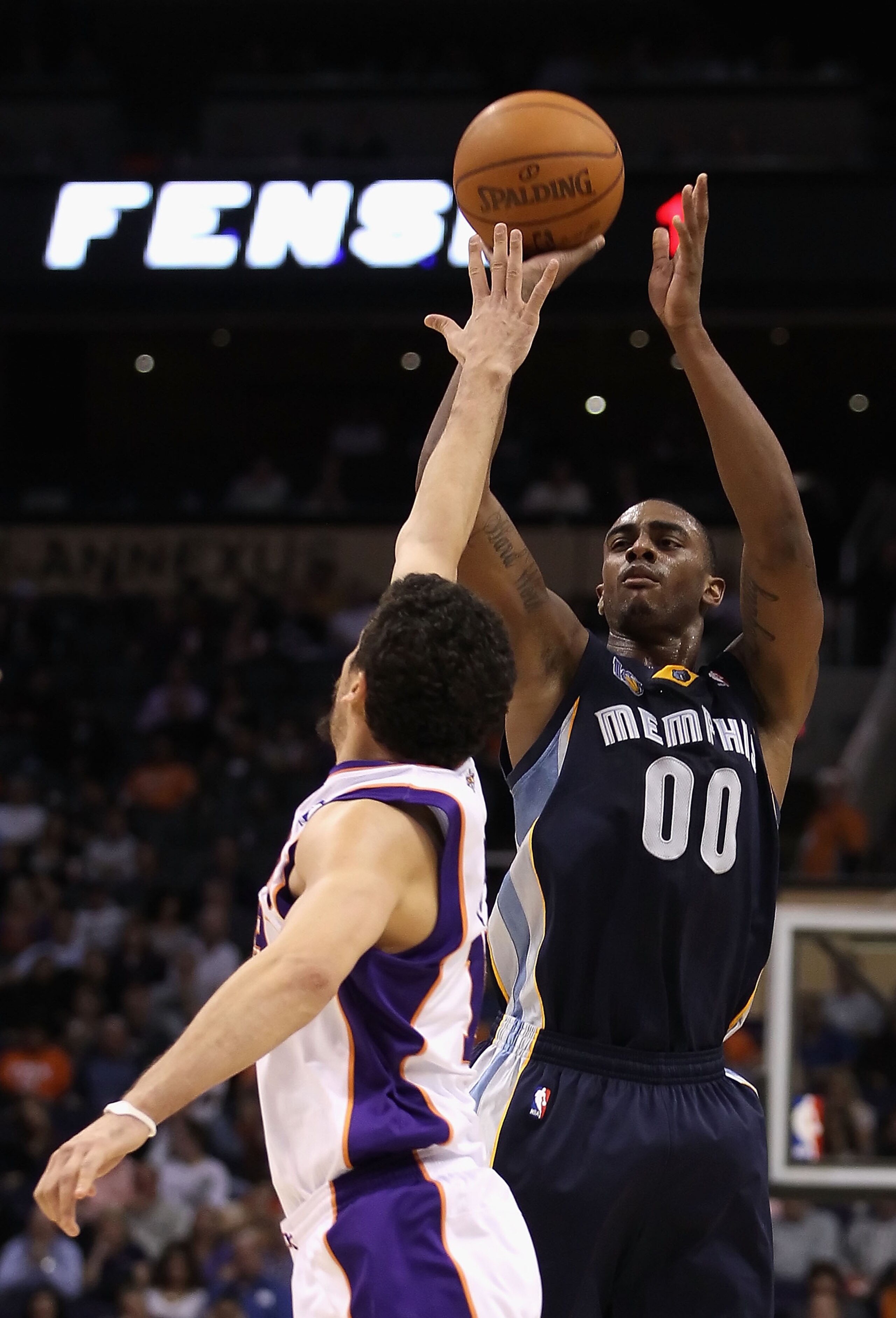 PHOENIX - DECEMBER 08:  Darrell Arthur #00 of the Memphis Grizzlies puts up a shot against the Phoenix Suns during the NBA game at US Airways Center on December 8, 2010 in Phoenix, Arizona. NOTE TO USER: User expressly acknowledges and agrees that, by dow