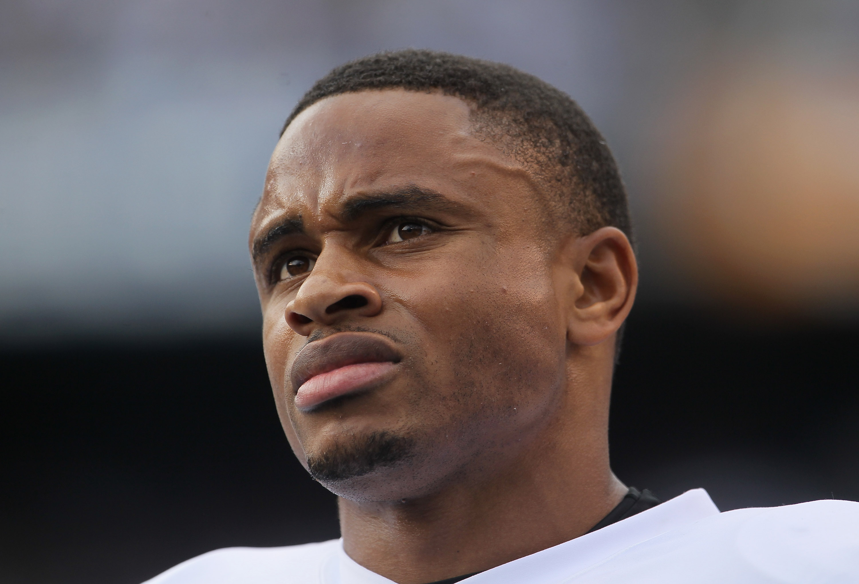 SAN DIEGO - DECEMBER 05:  Nnamdi Asomugha #21 the Oakland Raiders looks on from the sideline against the San Diego Chargers at Qualcomm Stadium on December 5, 2010 in San Diego, California. The Raiders defeated the Chargers 28-13.  (Photo by Jeff Gross/Ge