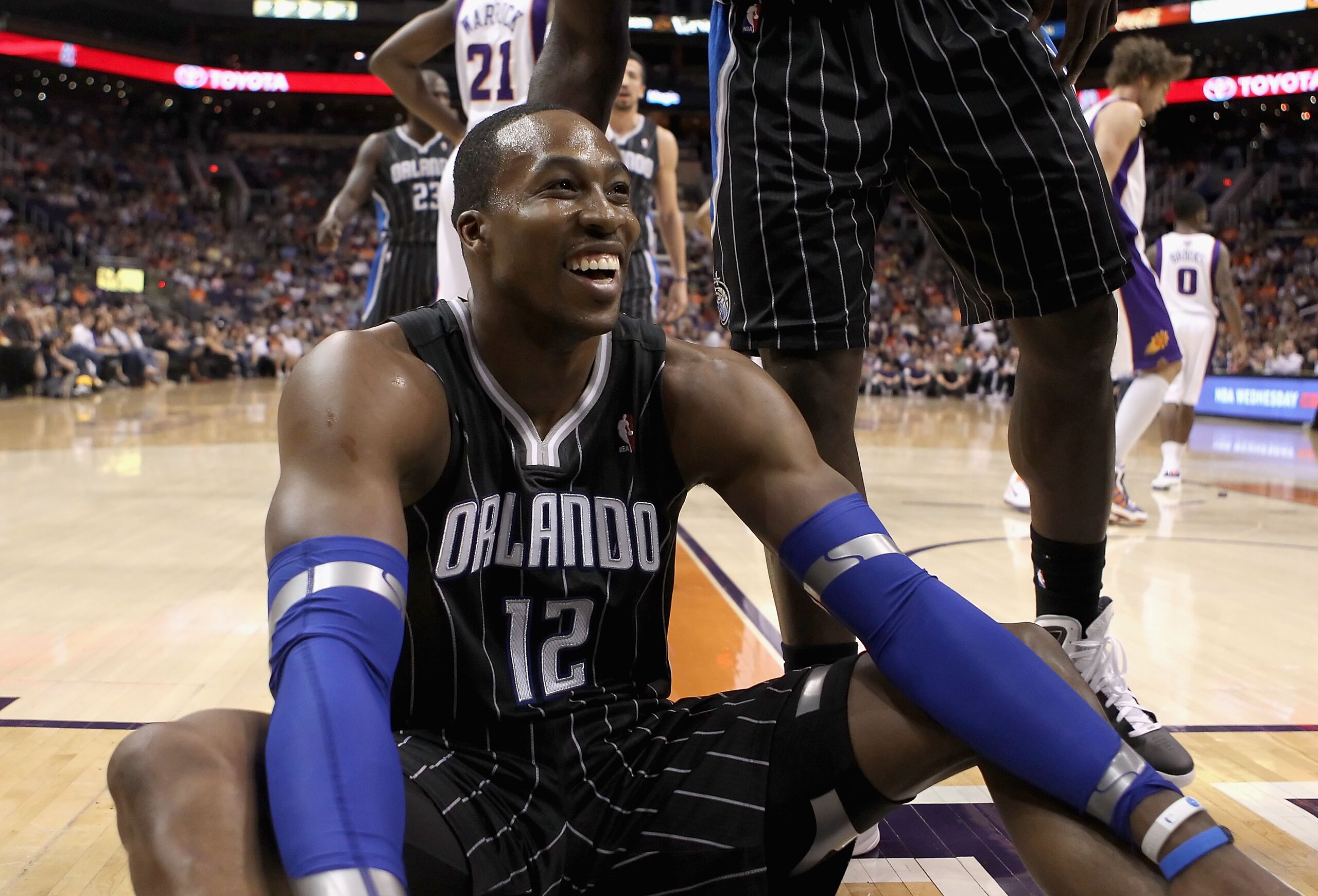 PHOENIX, AZ - MARCH 13:  Dwight Howard #12 of the Orlando Magic reacts to a foul call during the NBA game against the Phoenix Suns at US Airways Center on March 13, 2011 in Phoenix, Arizona. The Magic defeated the Suns 111-88. NOTE TO USER: User expressly