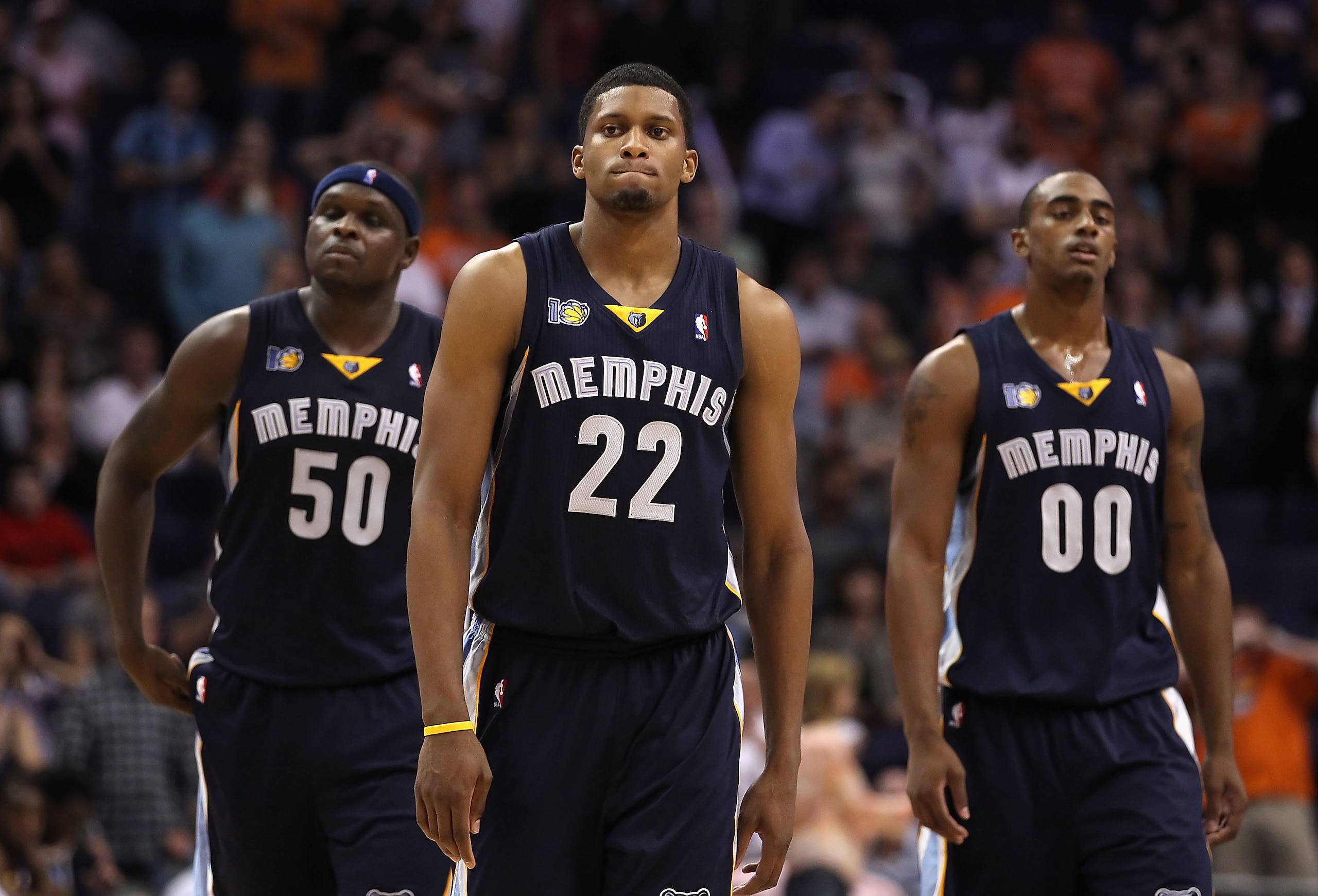 PHOENIX - NOVEMBER 05:  (L-R) Zach Randolph #50, Rudy Gay #22 and Darrell Arthur #00 of the Memphis Grizzlies react in the final moments of the NBA game against the Phoenix Suns at US Airways Center on November 5, 2010 in Phoenix, Arizona. The Suns defeat