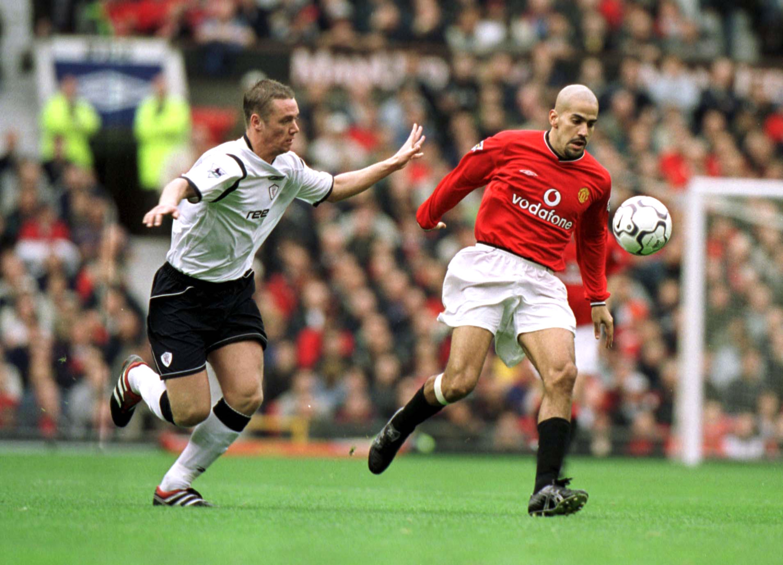 20 Oct 2001:  Juan Veron of Man Utd clashes with Kevin Nolan of Bolton during the Manchester United v Bolton Wanderers FA Barclaycard Premiership match at Old Trafford, Manchester. Mandatory Credit: Alex Livesey/ALLSPORT